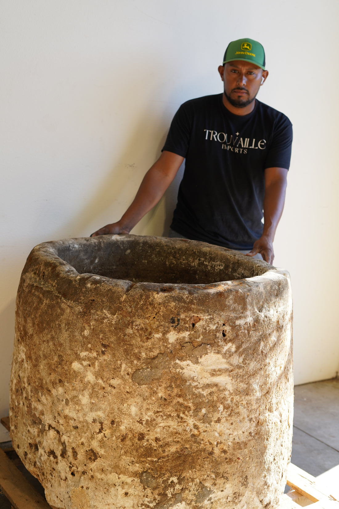 Antique Hand Carved Limestone Round Planter which can be converted into a beautiful fountain or fire pit. Dimensions: 32" H x 37" W. In partial sunlight