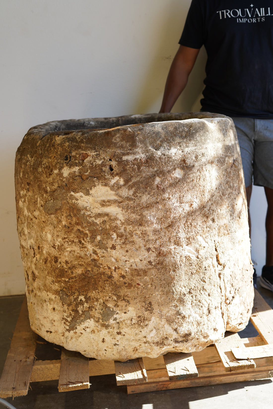 Antique Hand Carved Limestone Round Planter which can be converted into a beautiful fountain or fire pit. Dimensions: 32" H x 37" W. In partial sunlight