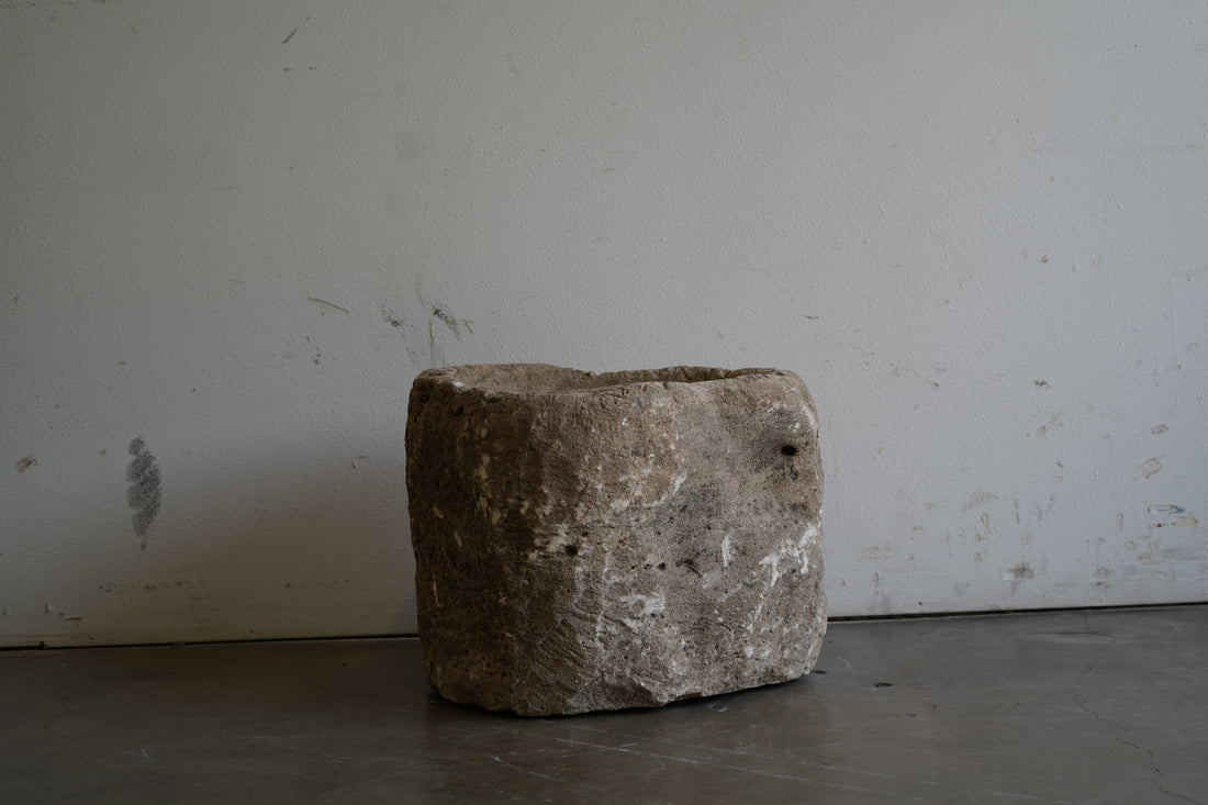 Antique Limestone Planter with natural aging, character, nail holes, uneven edge.&nbsp;

24" D x 20" H