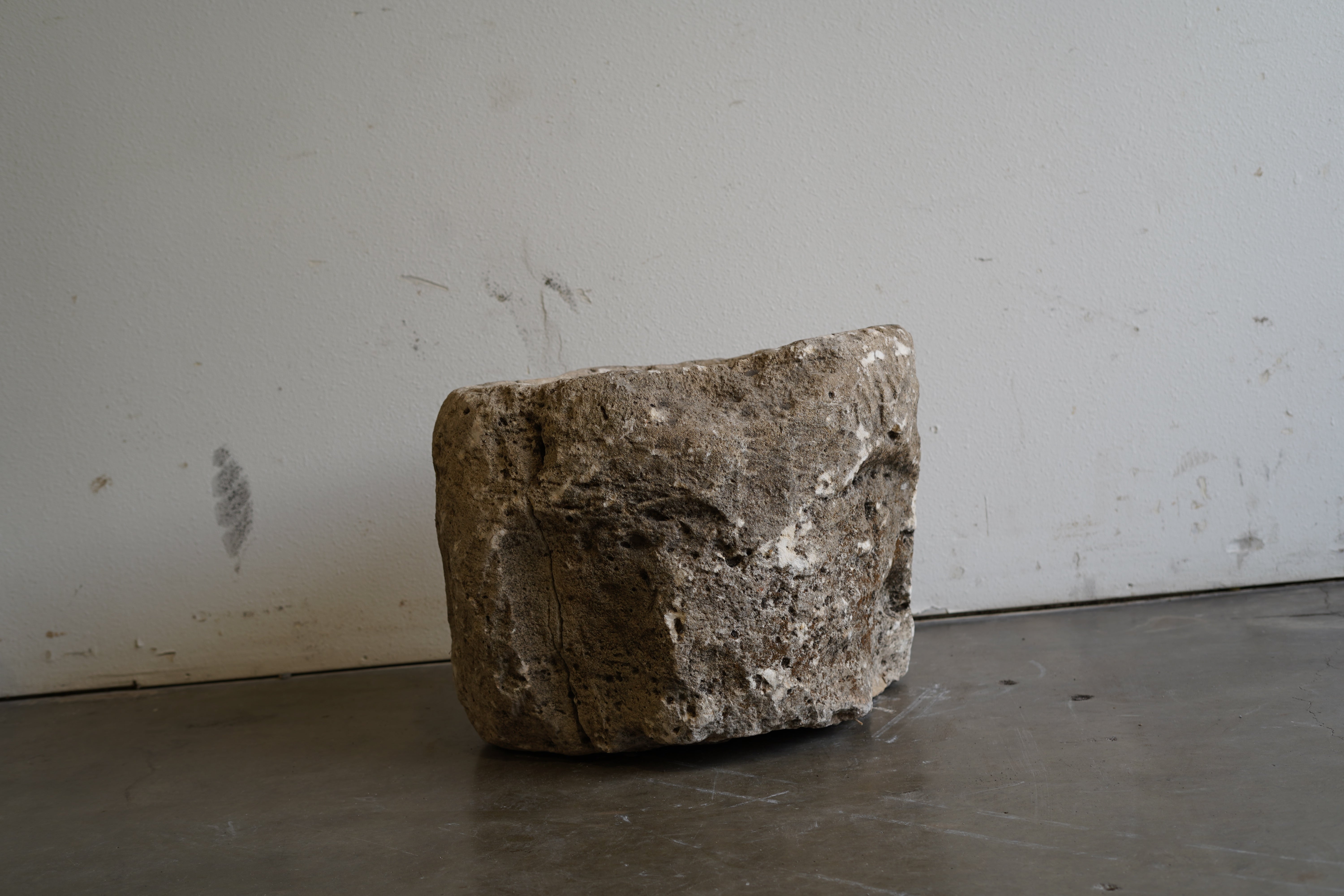 Antique Limestone Planter with natural aging, character, nail holes, uneven edge.&nbsp;

24" D x 20" H