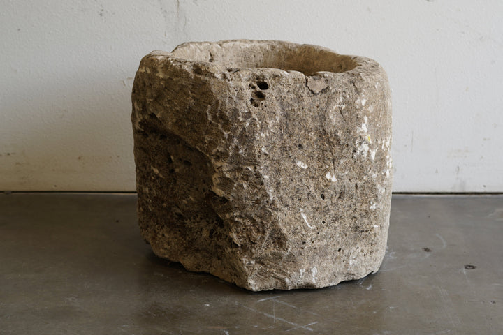 Antique Limestone Planter with natural aging, character, nail holes, uneven edge.&nbsp;

24" D x 20" H
