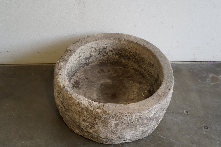 Top down view  of Antique Round Hand-carved Limestone planter

Dimensions: 27" D x 12" H