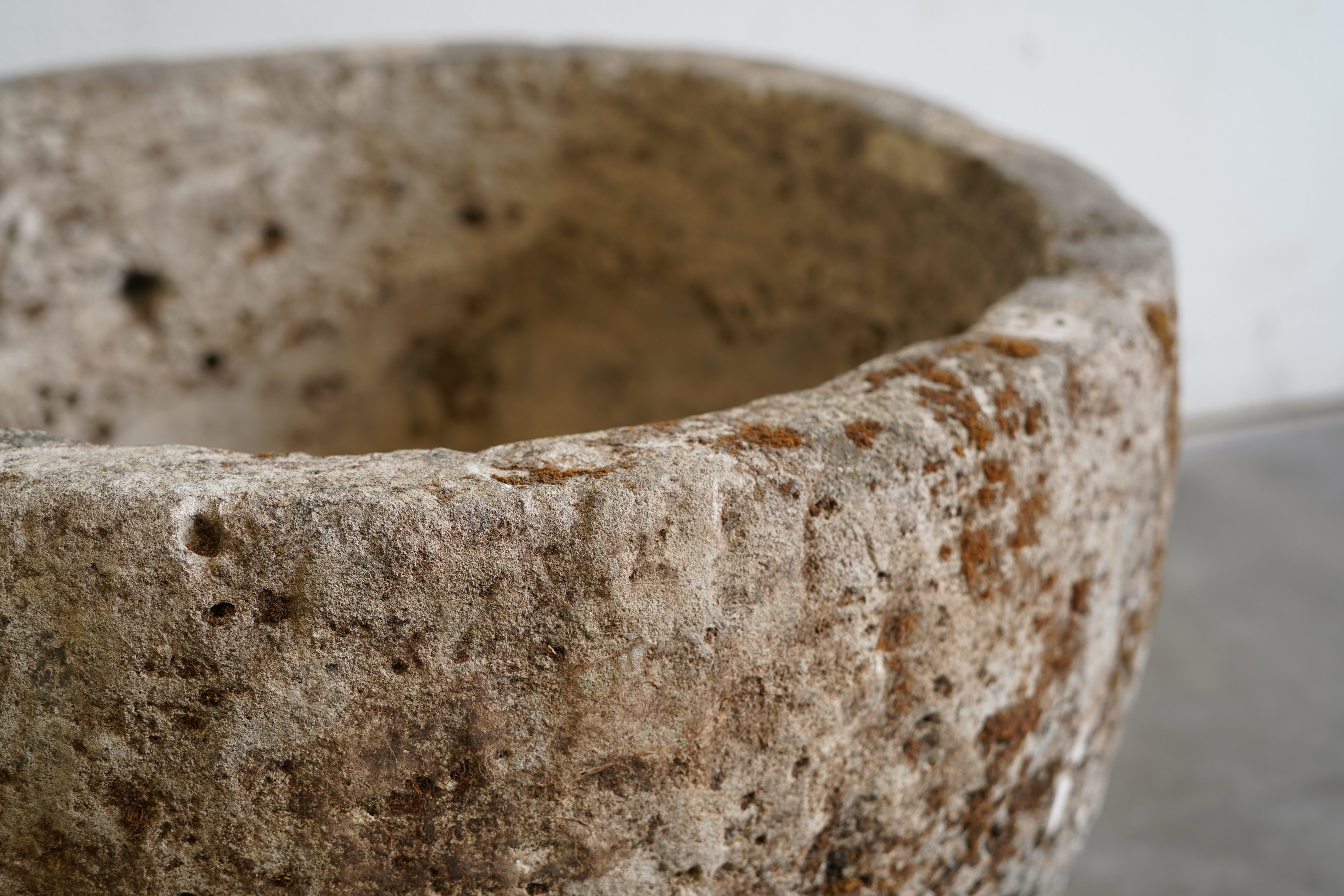Close up of natural patina on Antique Limestone Round Planter