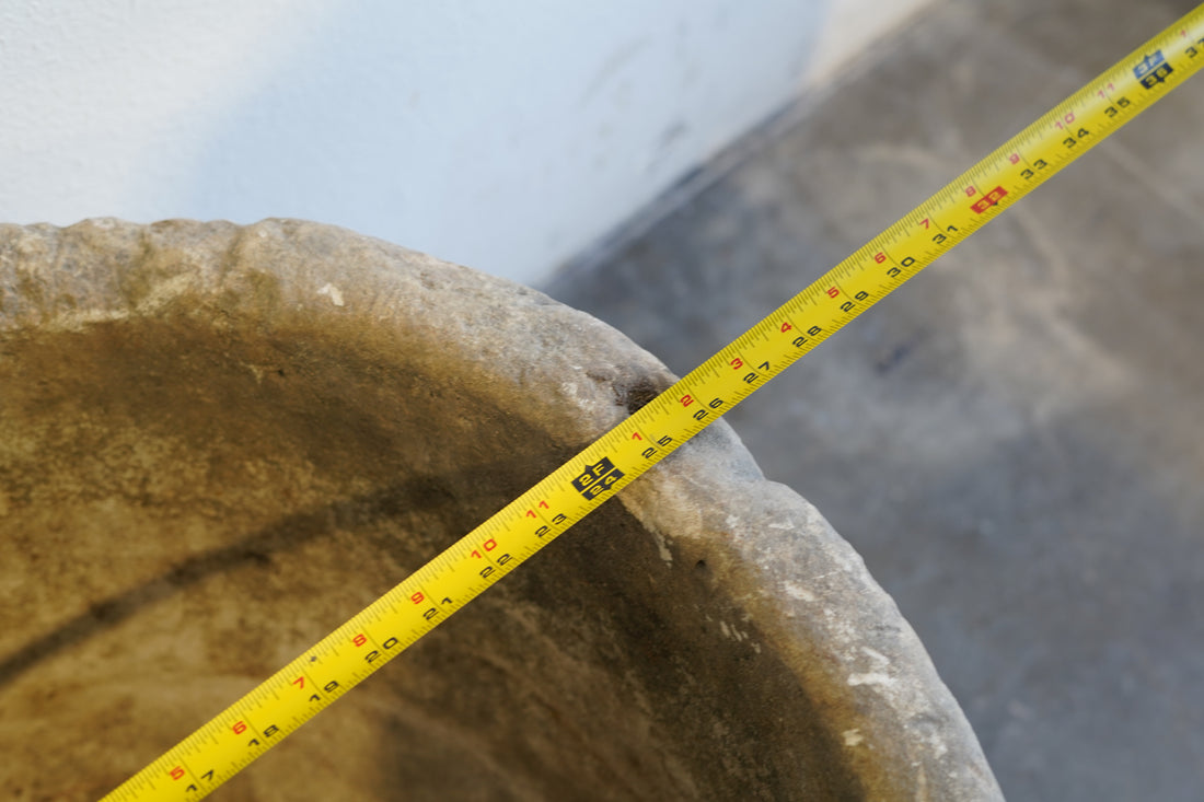Close up of lip of Antique Round Limestone Planter. 28" W x 17" H. Can be converted to fountain or fire pit. hand-carved, authentic limestone.