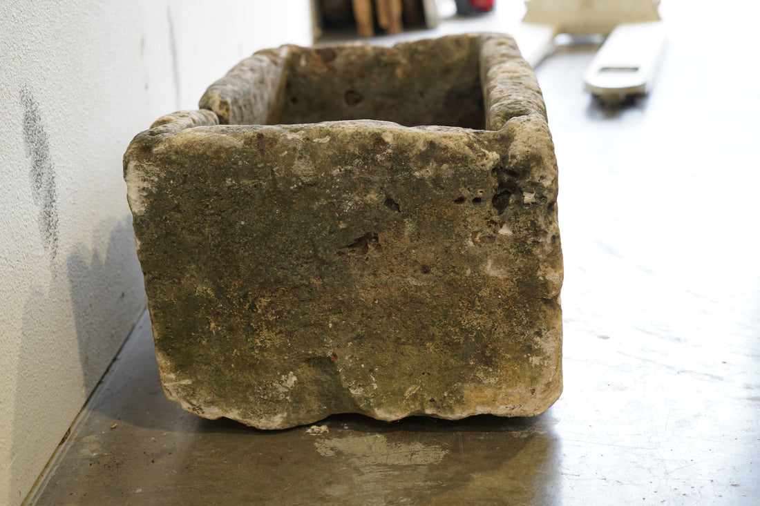 Side view of Antique Limestone Trough

Hand-Carved, Authentic Limestone

Dimensions: 29" L x 16" W x 13" H