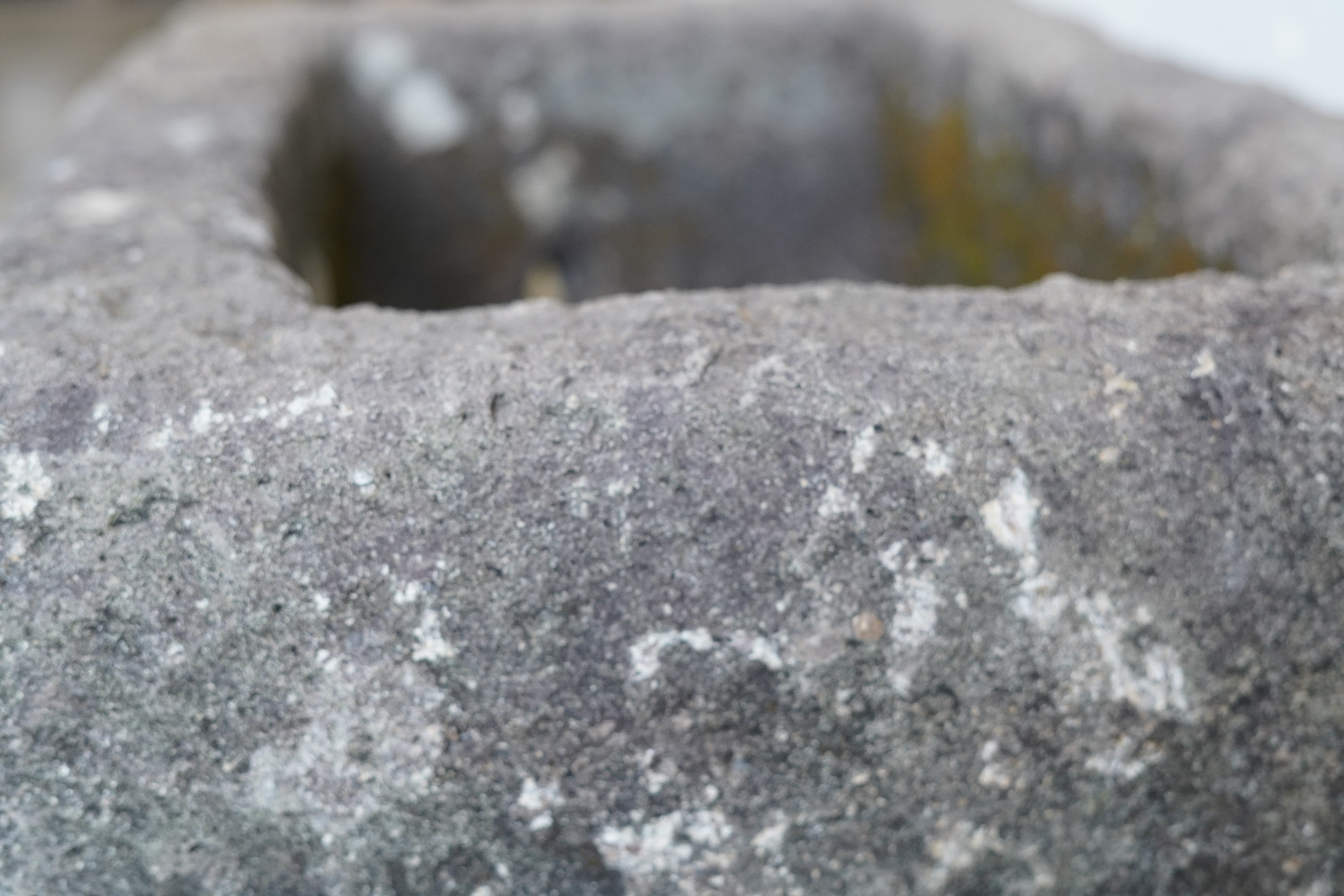 Close up of natural aging and character on Antique Limestone Trough
Hand-carved character and aging on the exterior.