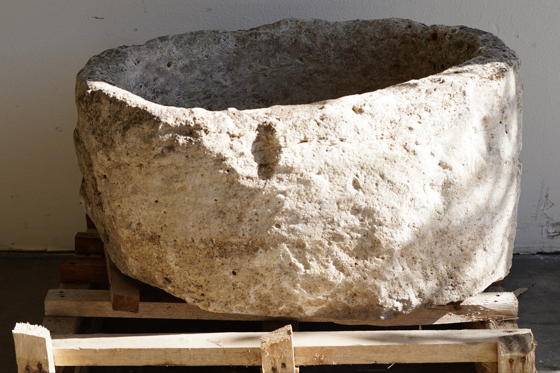 Antique Oval Shaped Limestone Planter. Dimensions: 32" L x 24" W x 17" H