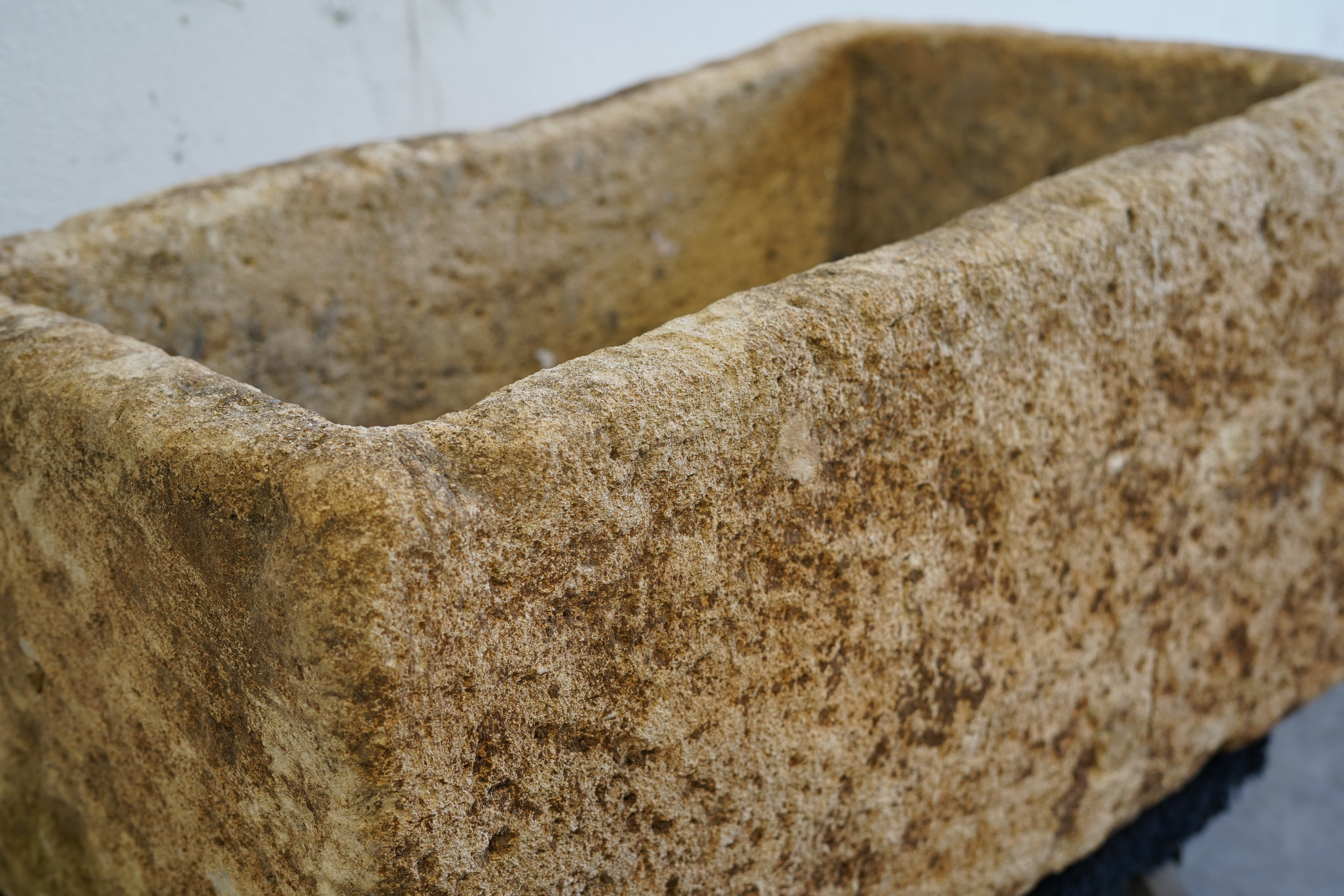 Natural patina on antique limestone trough