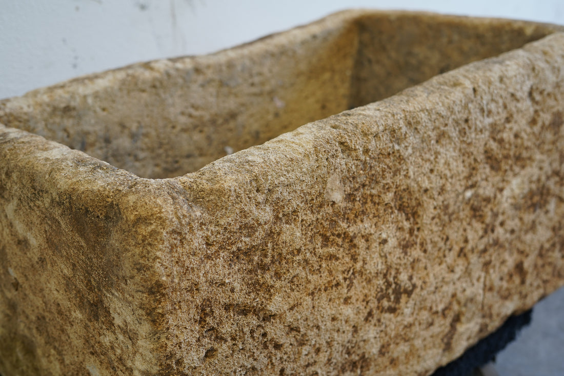 Natural patina on antique limestone trough