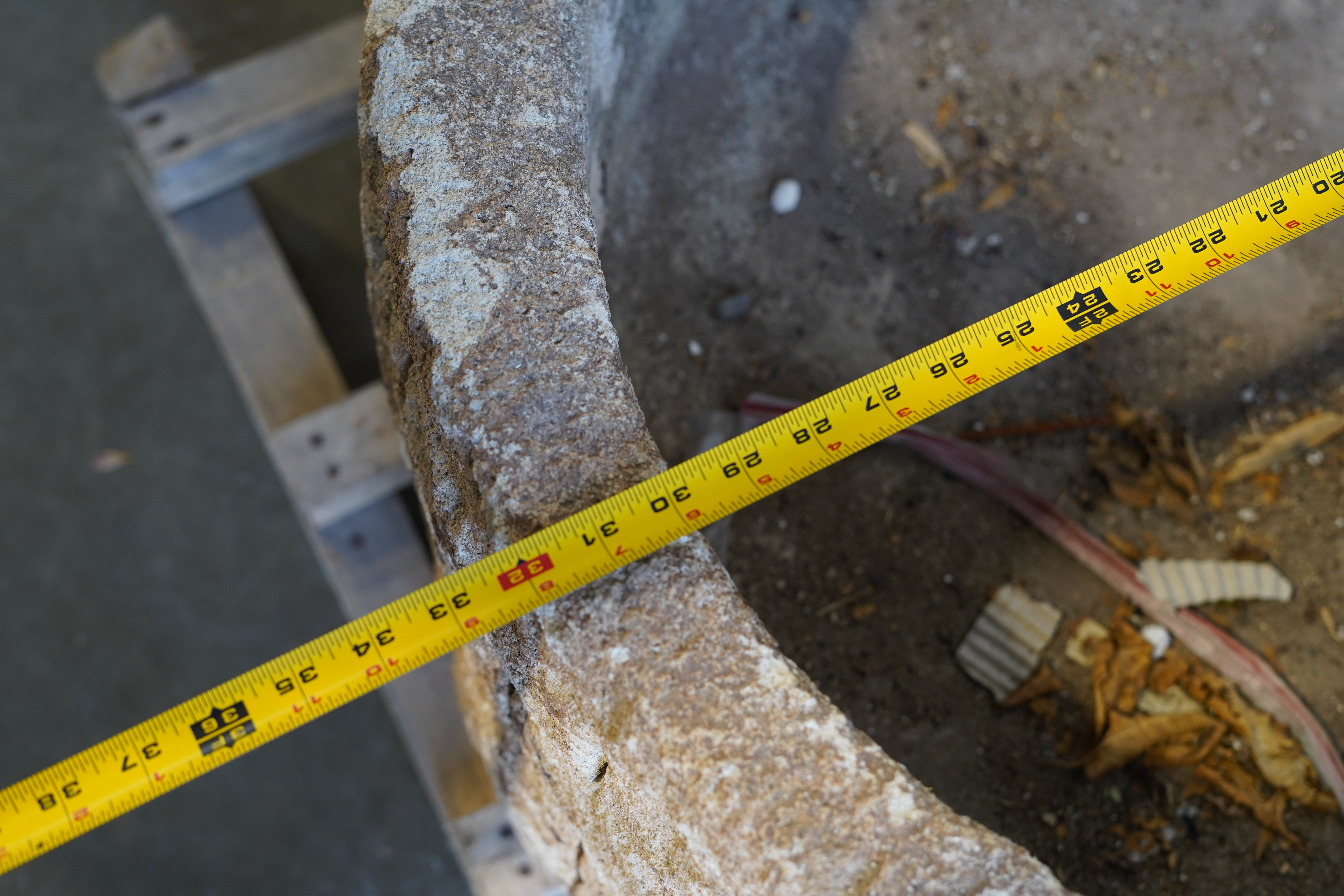 Top down view, close up of Antique LImestone Planter with hand-carvings on the outside and natural patina