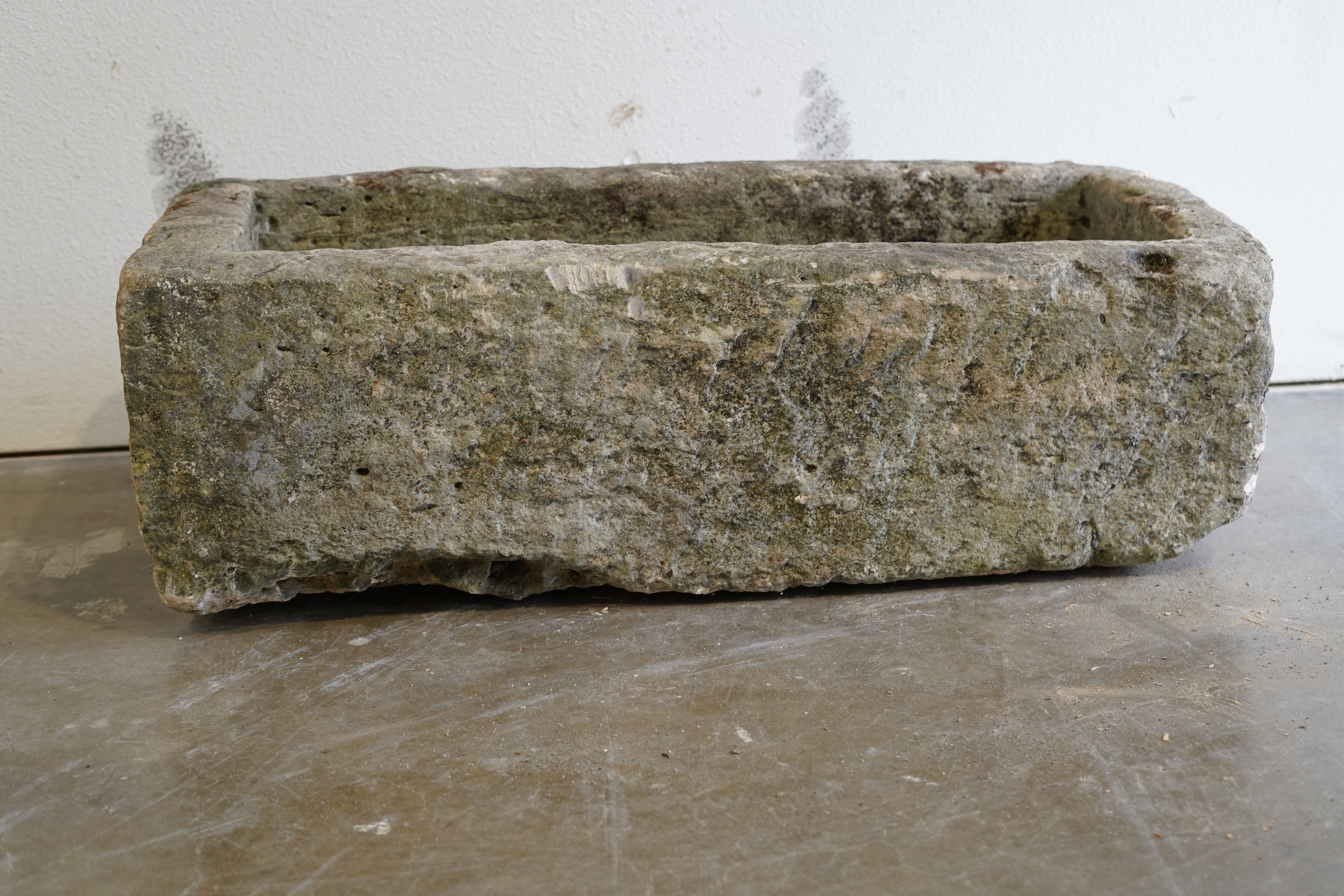 Antique Limestone Trough

Very Rare

Hand-carved, authentic limestone planter

37" L x 17" W x 13" H