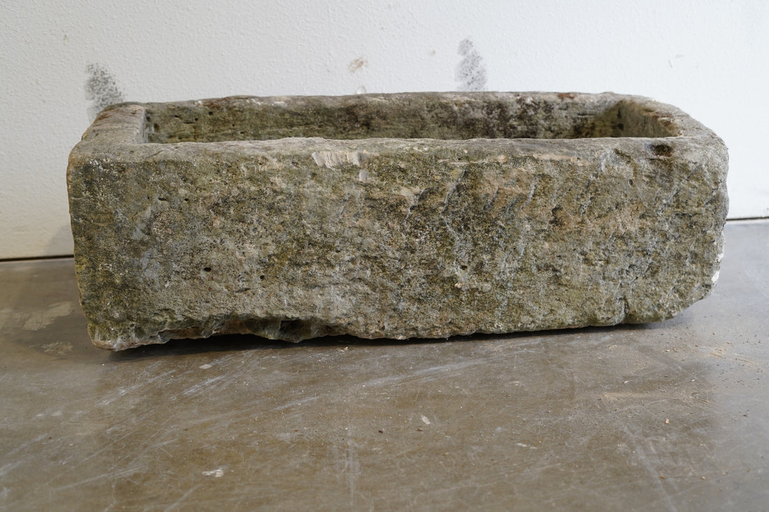 Antique Limestone Trough

Very Rare

Hand-carved, authentic limestone planter

37" L x 17" W x 13" H