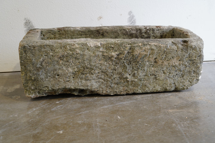 Antique Limestone Trough

Very Rare

Hand-carved, authentic limestone planter

37" L x 17" W x 13" H