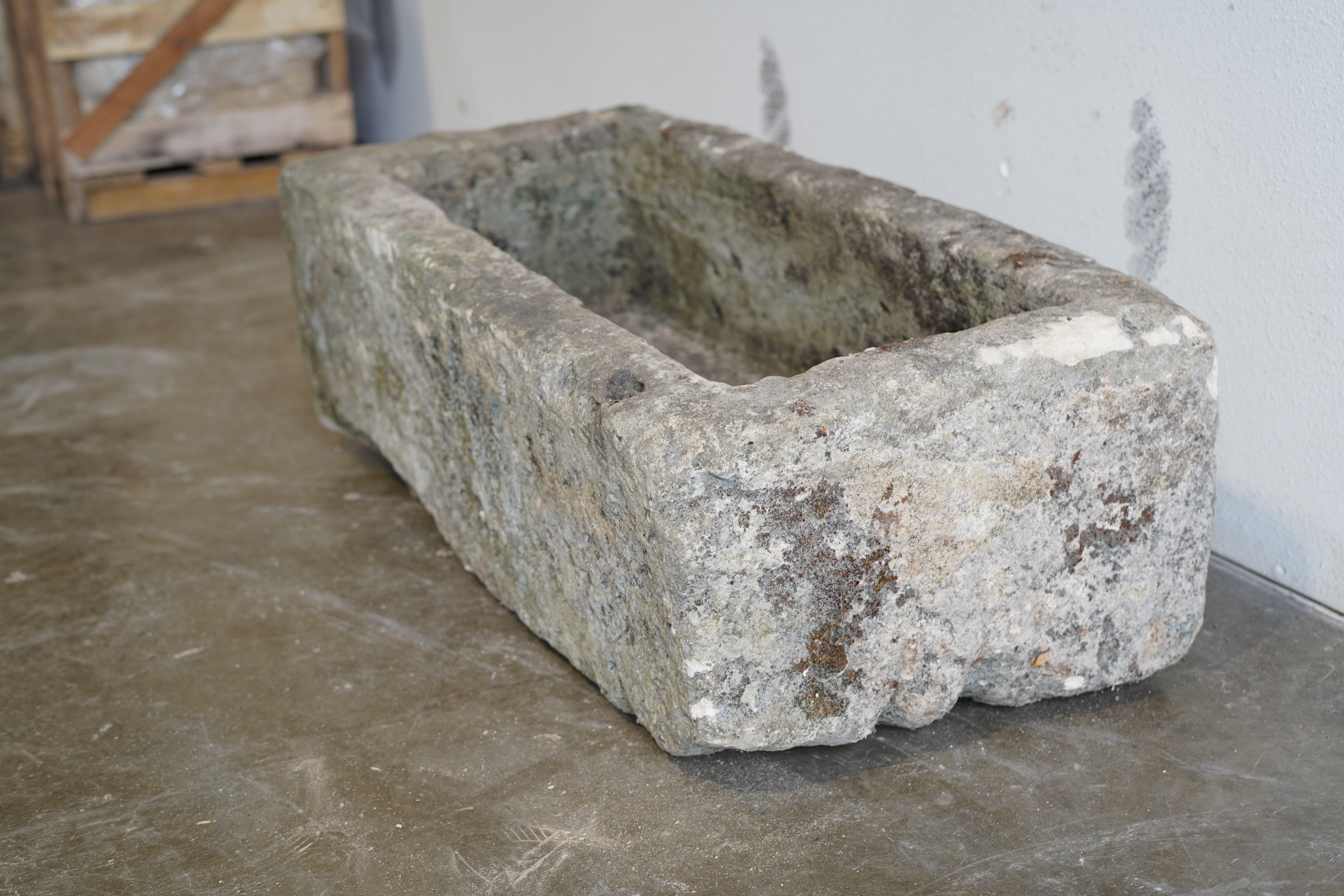 Side view of Antique Limestone Trough

Very Rare

Hand-carved, authentic limestone planter

37" L x 17" W x 13" H