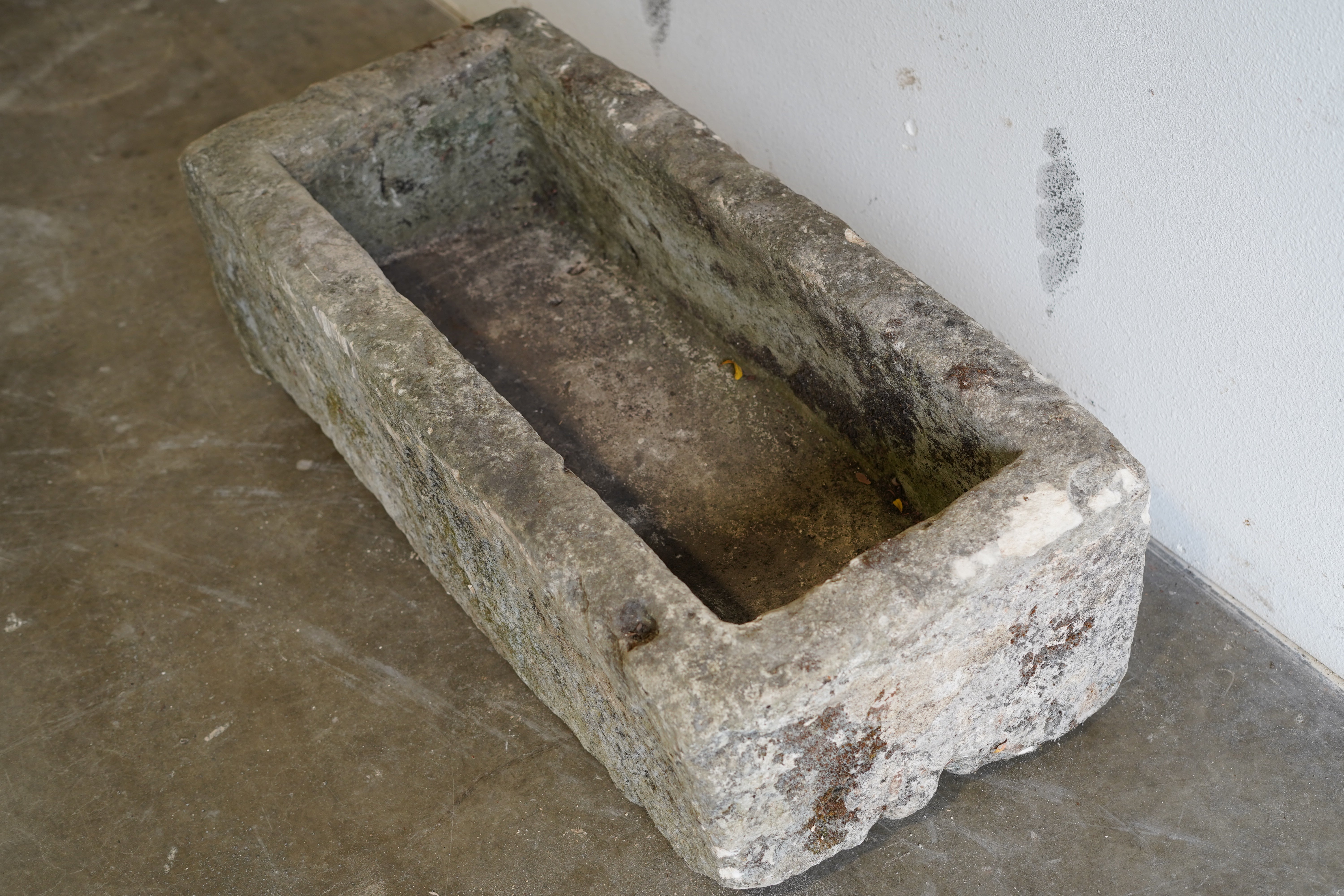 Top down view of Antique Limestone Trough

Very Rare

Hand-carved, authentic limestone planter

37" L x 17" W x 13" H