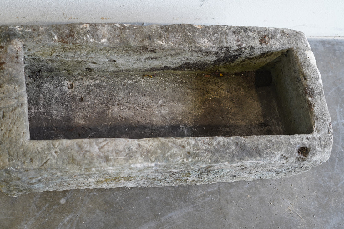 Top down view of Antique Limestone Trough

Very Rare

Hand-carved, authentic limestone planter

37" L x 17" W x 13" H