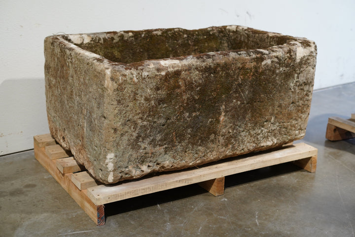 hand-carved authentic limestone trough