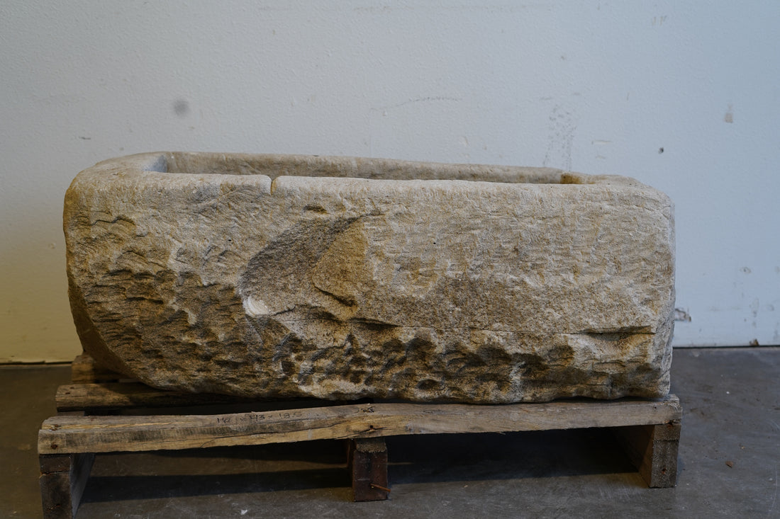 Antique limestone planter trough front view with natural weathered patina, 43 inches long