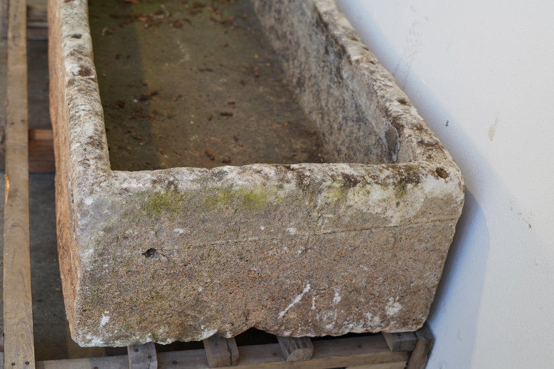 side view of Rectangular Authentic Antique Limestone Trough Planter which can be converted into fountain or fire pit. 66" L x 28" W x 16" H