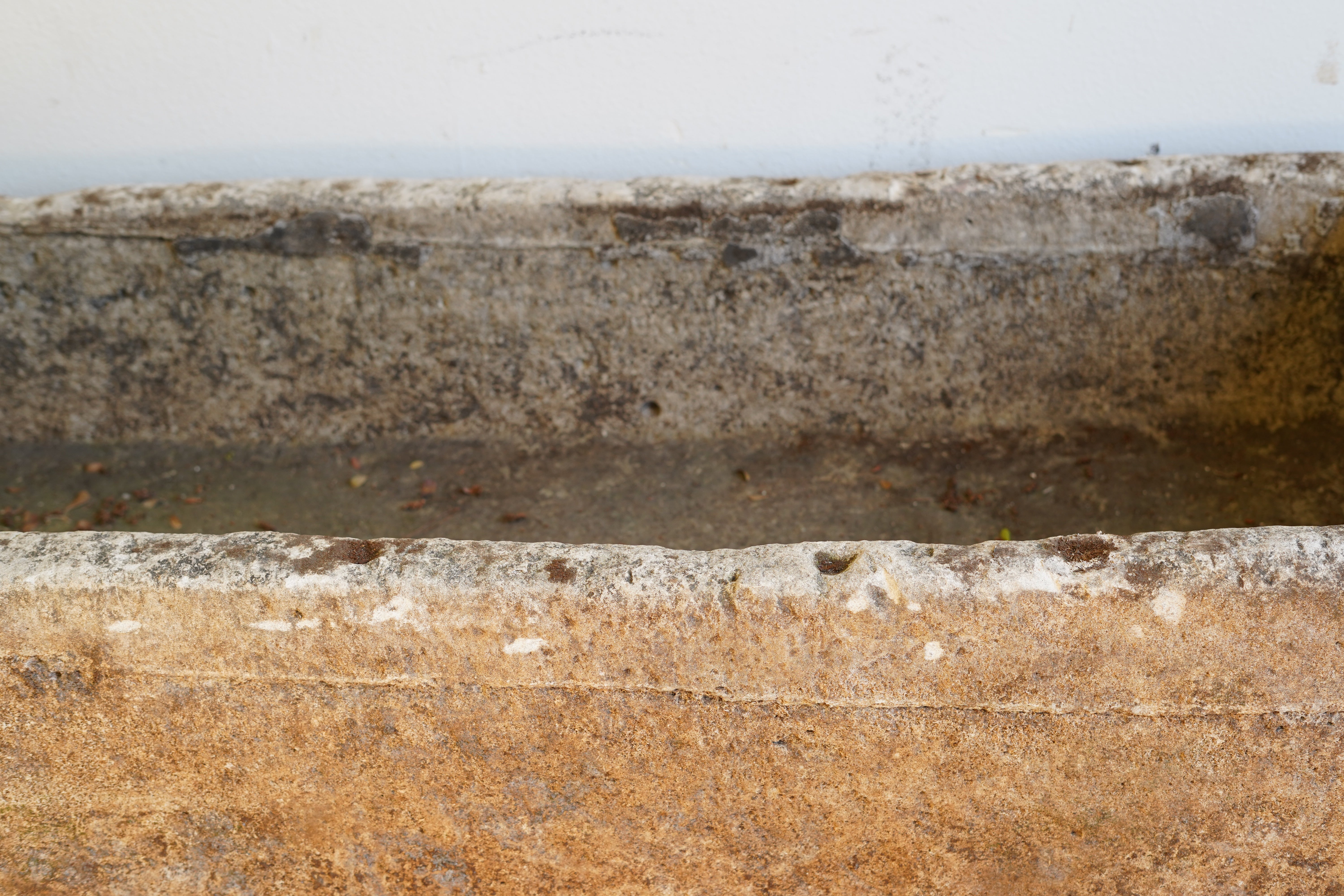 Top view of Rectangular Authentic Antique Limestone Trough Planter which can be converted into fountain or fire pit. 66" L x 28" W x 16" H with natural wear, aging and patina.
