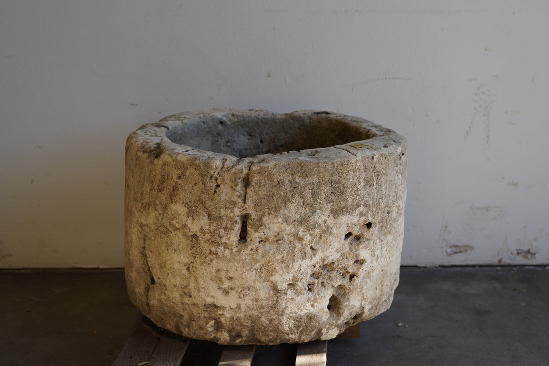 Antique Limestone Planter - Round. Dimensions: 18" H x 28" W