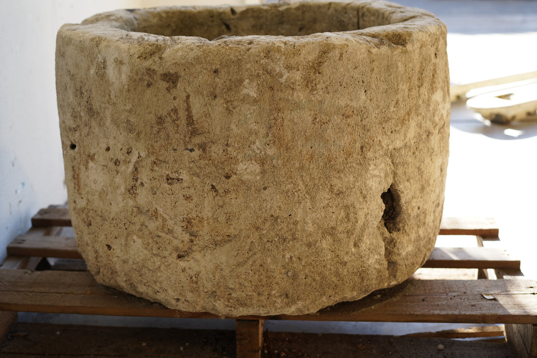 Close up of natural patina and aging on Antique Limestone Planter - Round. Dimensions: 18" H x 28" W