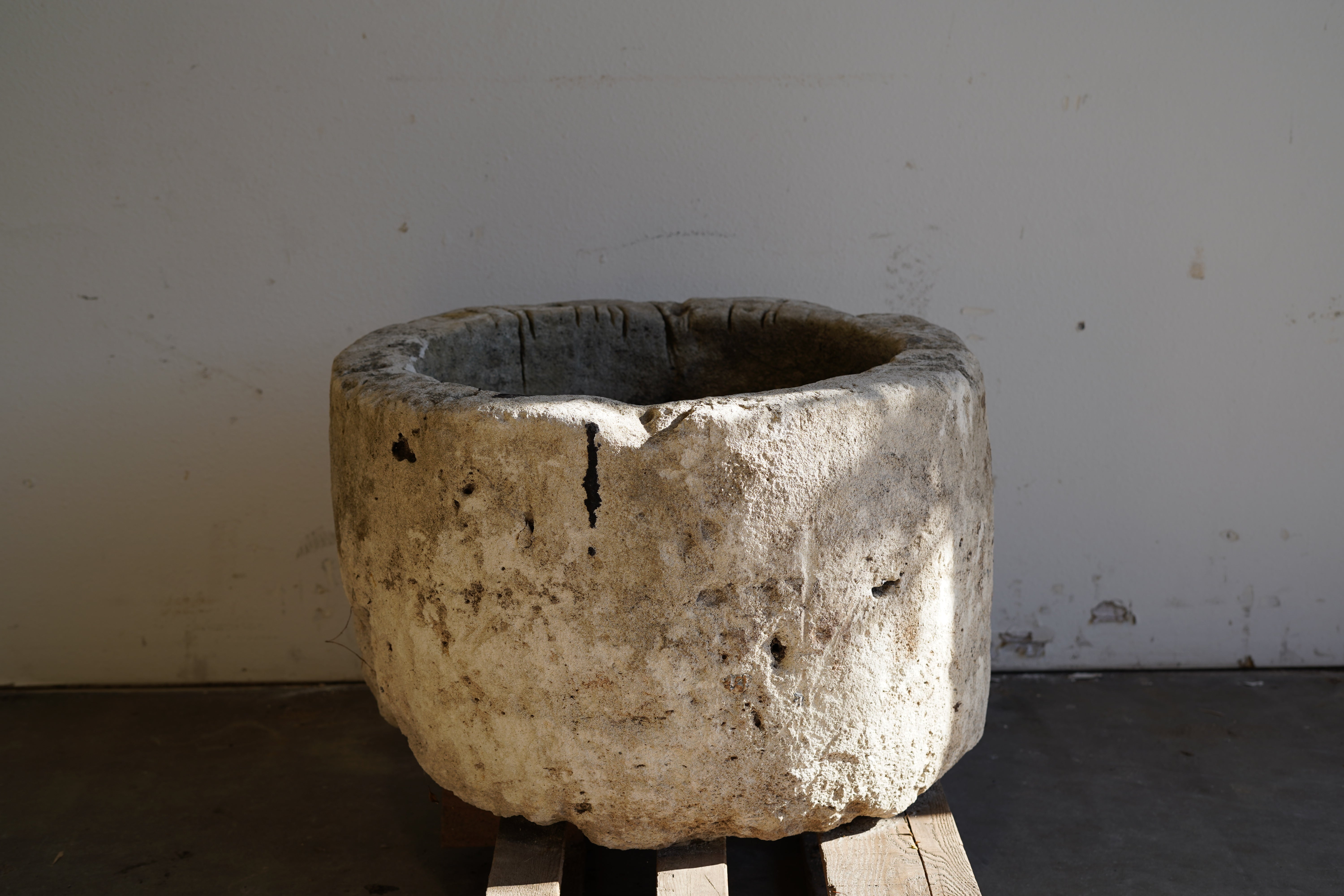 Antique Limestone Planter - Round. Dimensions: 18" H x 28" W