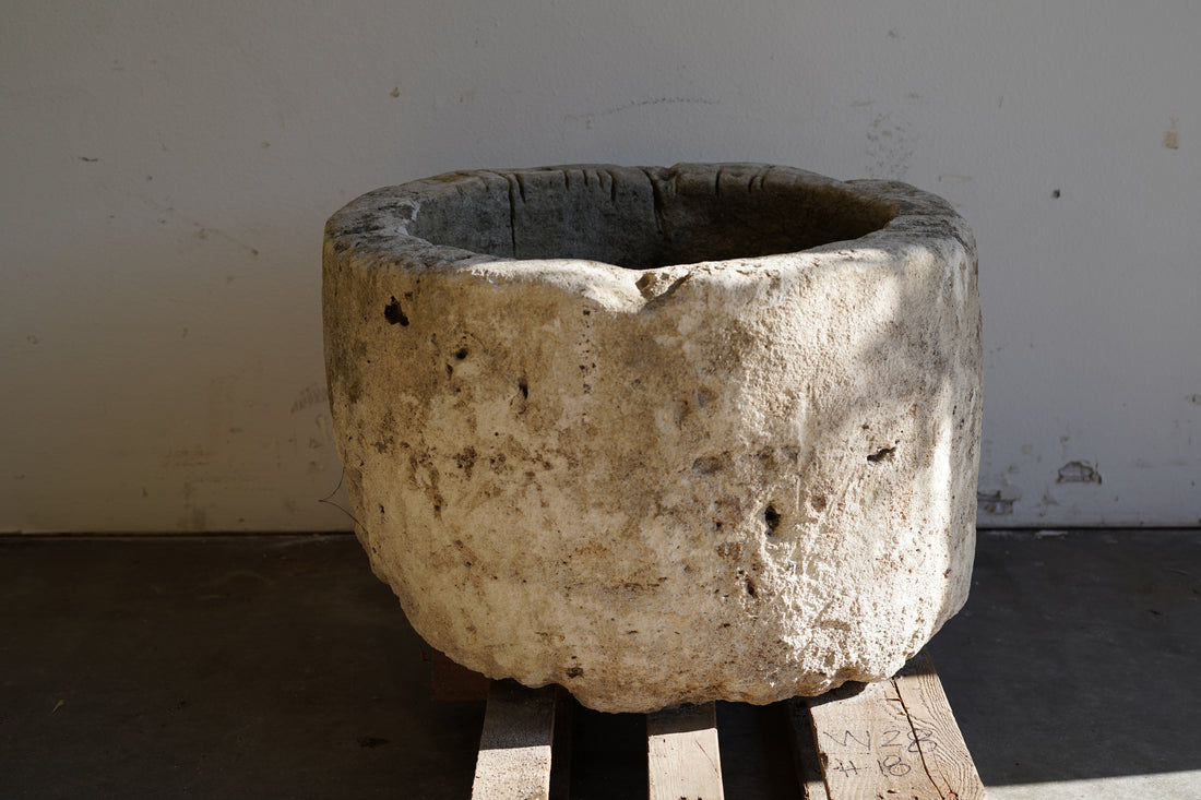Antique Limestone Planter - Round. Dimensions: 18" H x 28" W. 