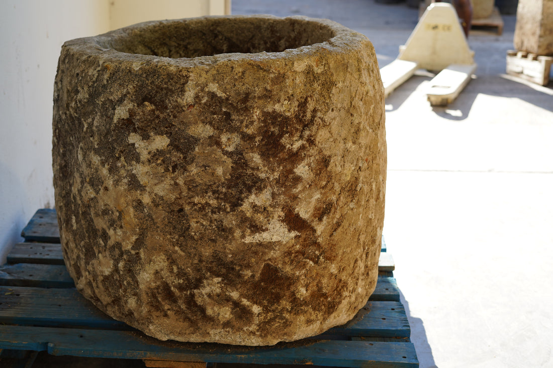 Antique Hand Carved Limestone Planter 25" H x 29" D with natural patina and beautiful aging. Indoor lighting.