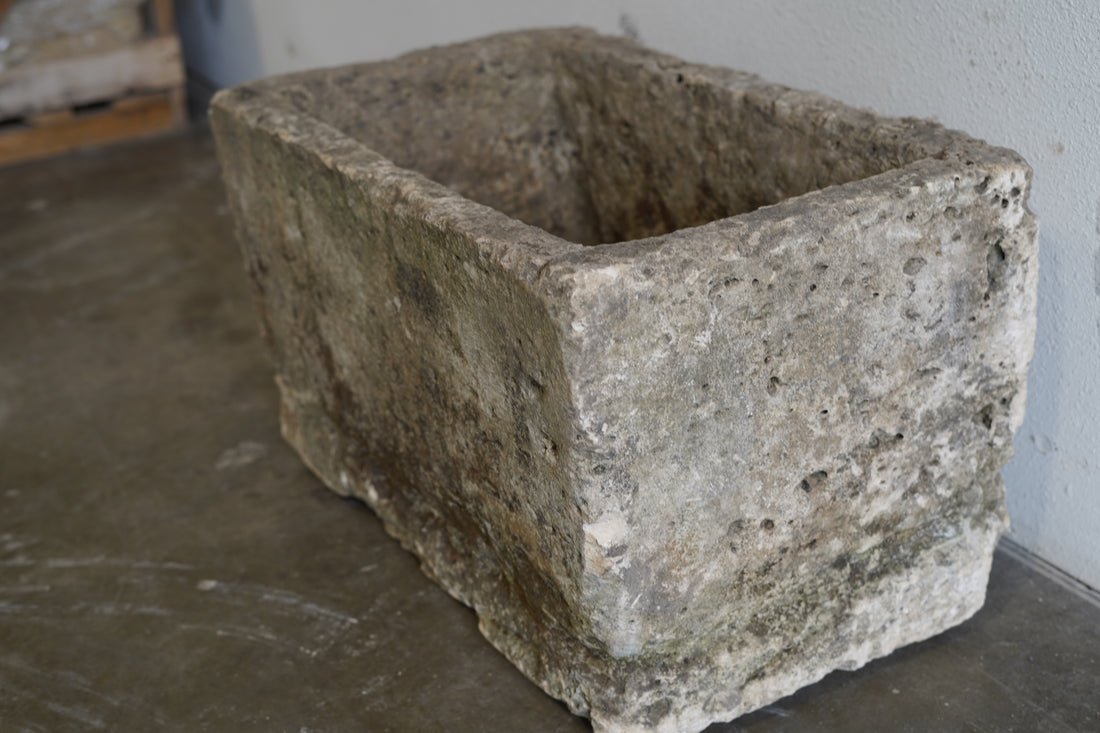 antique limestone trough. Hand-carved, authentic limestone piece.