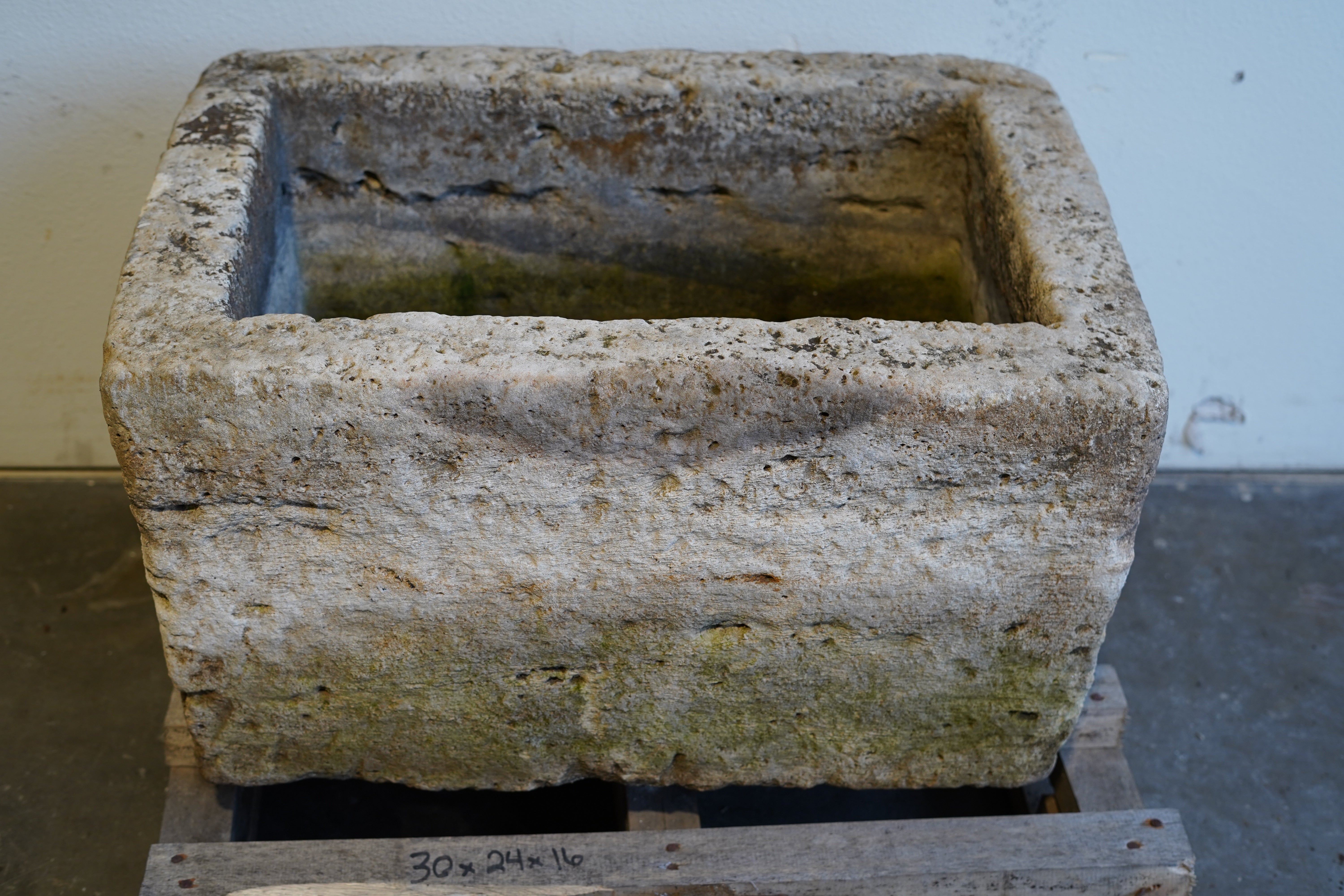 Antique limestone trough planter with aged patina, hand-carved rectangular design measuring 30L x 24W x 16H inches, perfect for rustic gardens or farmhouse-style interiors.