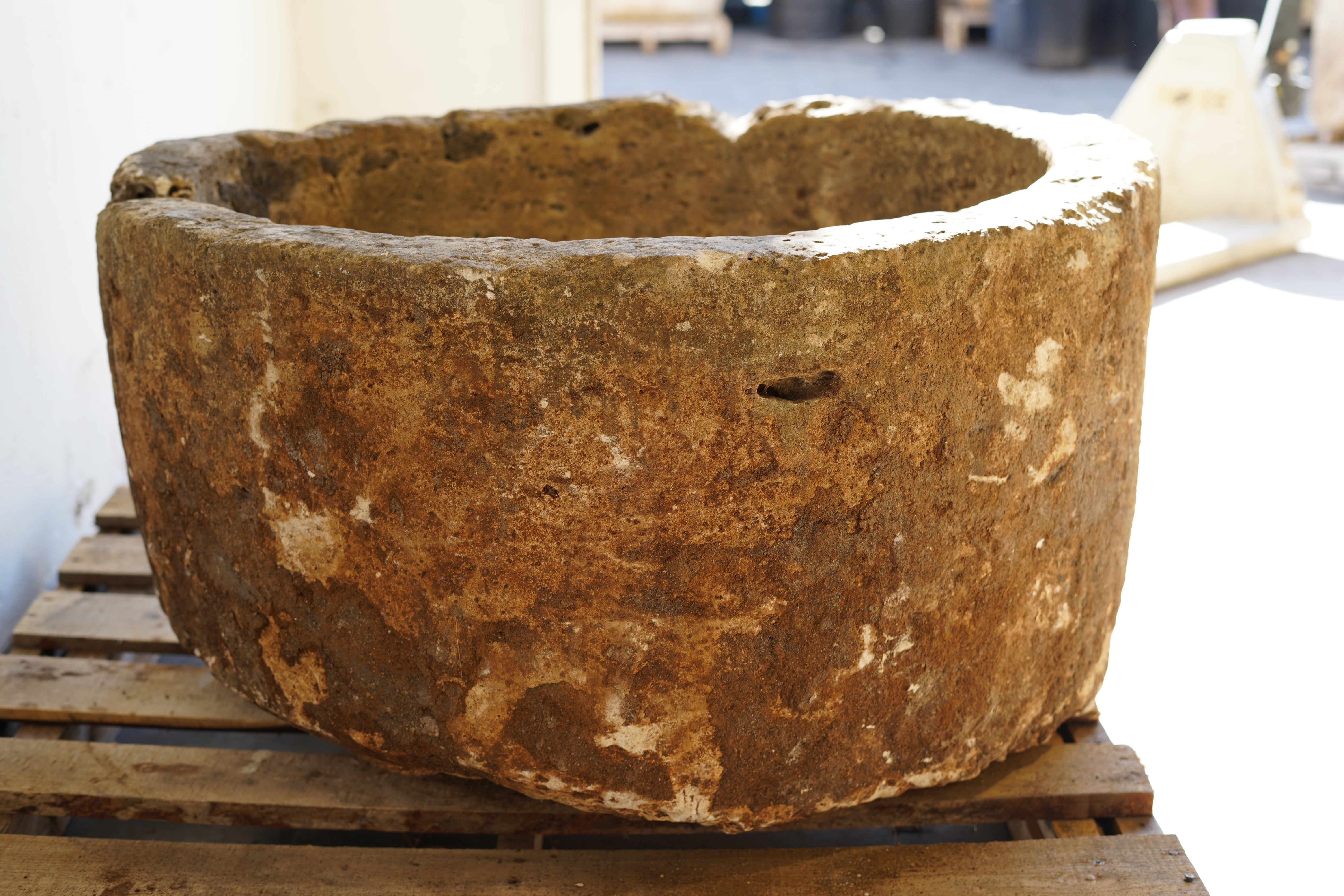 Antique Round Hand-Carved limestone with natural patina and aging over decades. Dimensions: 17" H x 33" W