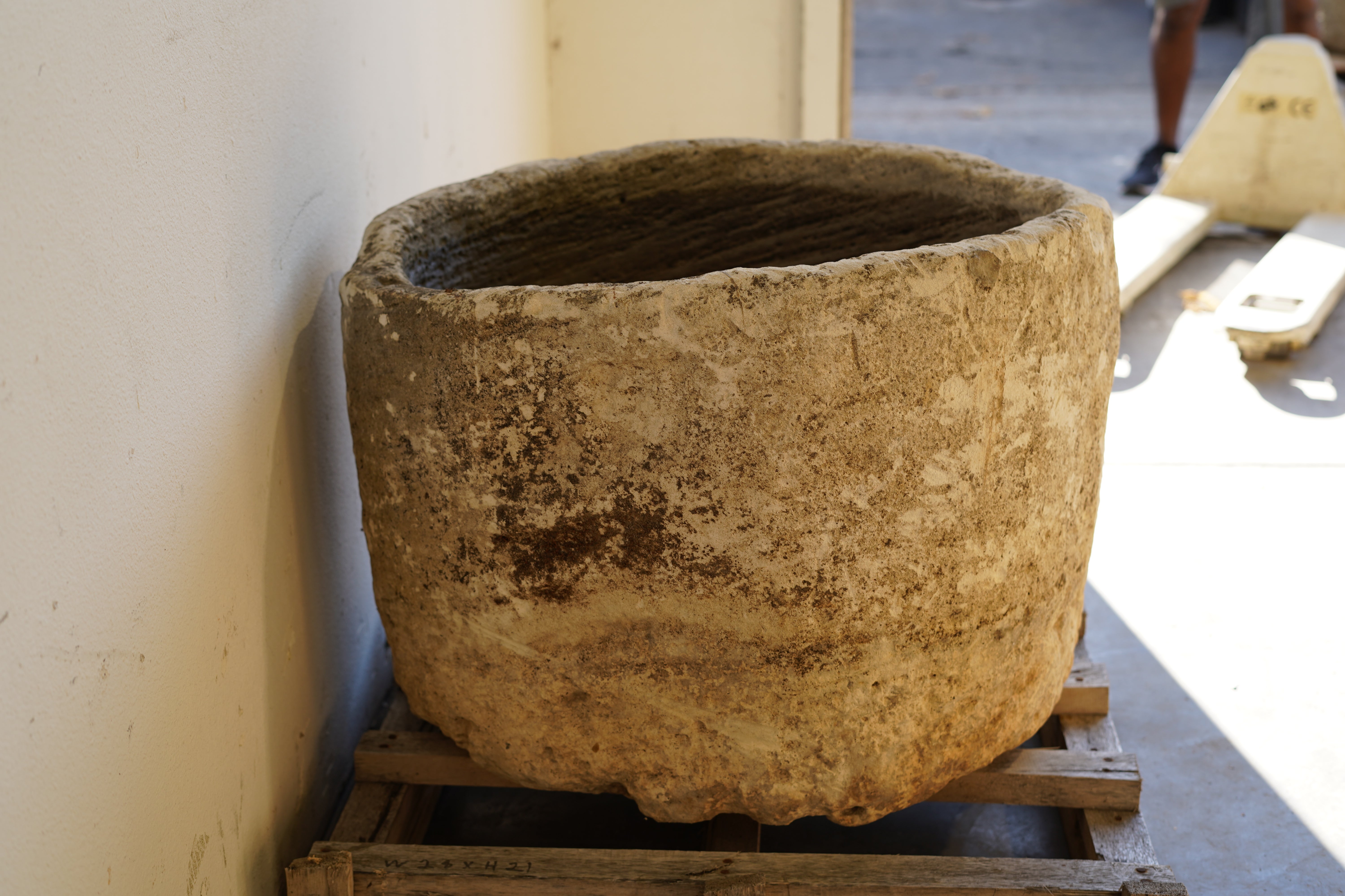 Side view of Round Limestone Antique Planter hand carve 28" H x 21" W