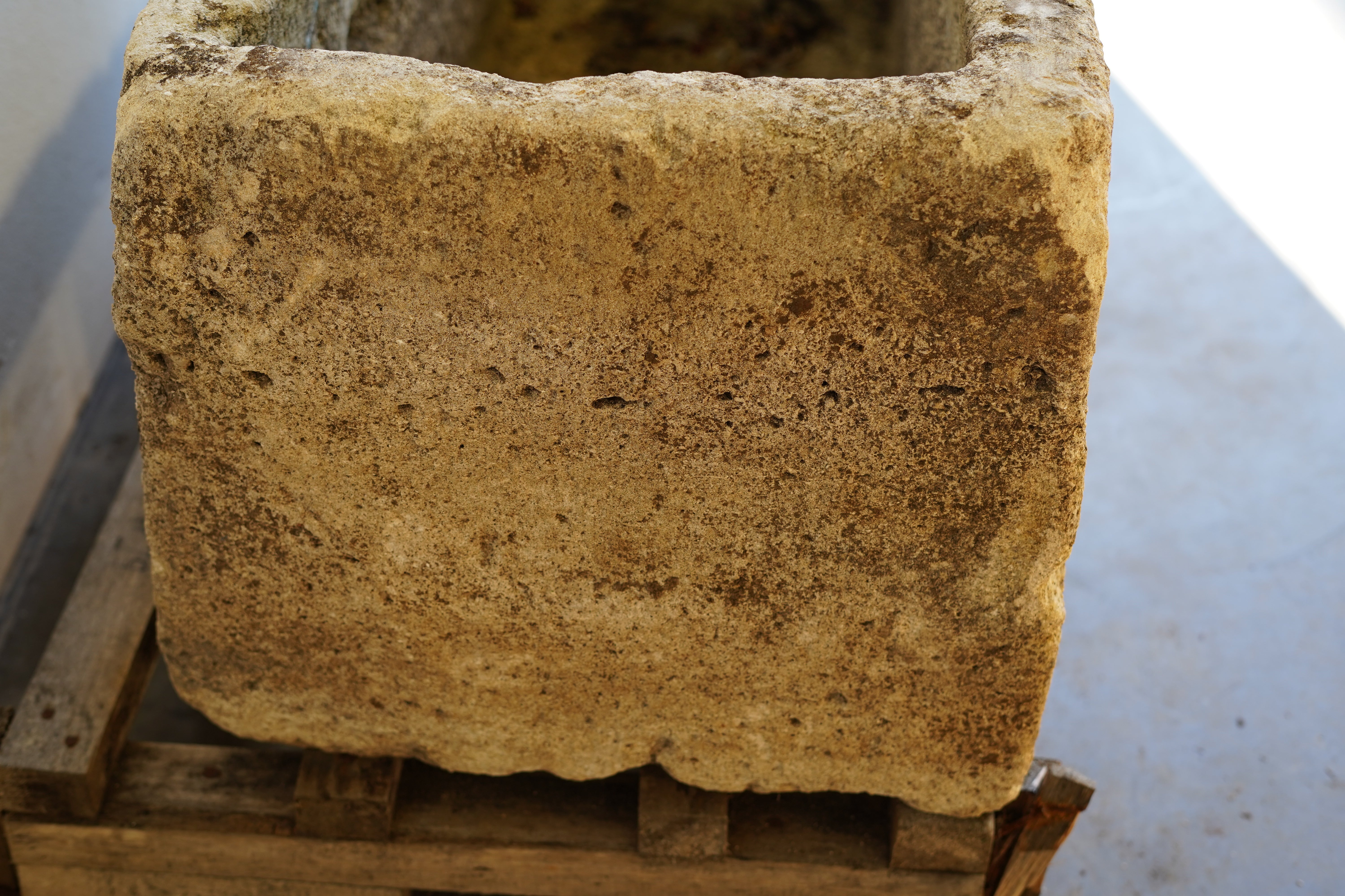 Side view close up of Antique Authentic Limestone Rectangular Square Planter 40" L x 17" W x 16" H with natural Patina and aging character.