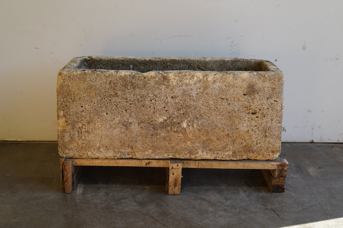 Front view of Antique Authentic Limestone Rectangular Square Planter 40" L x 17" W x 16" H with natural Patina in indoor lighting.