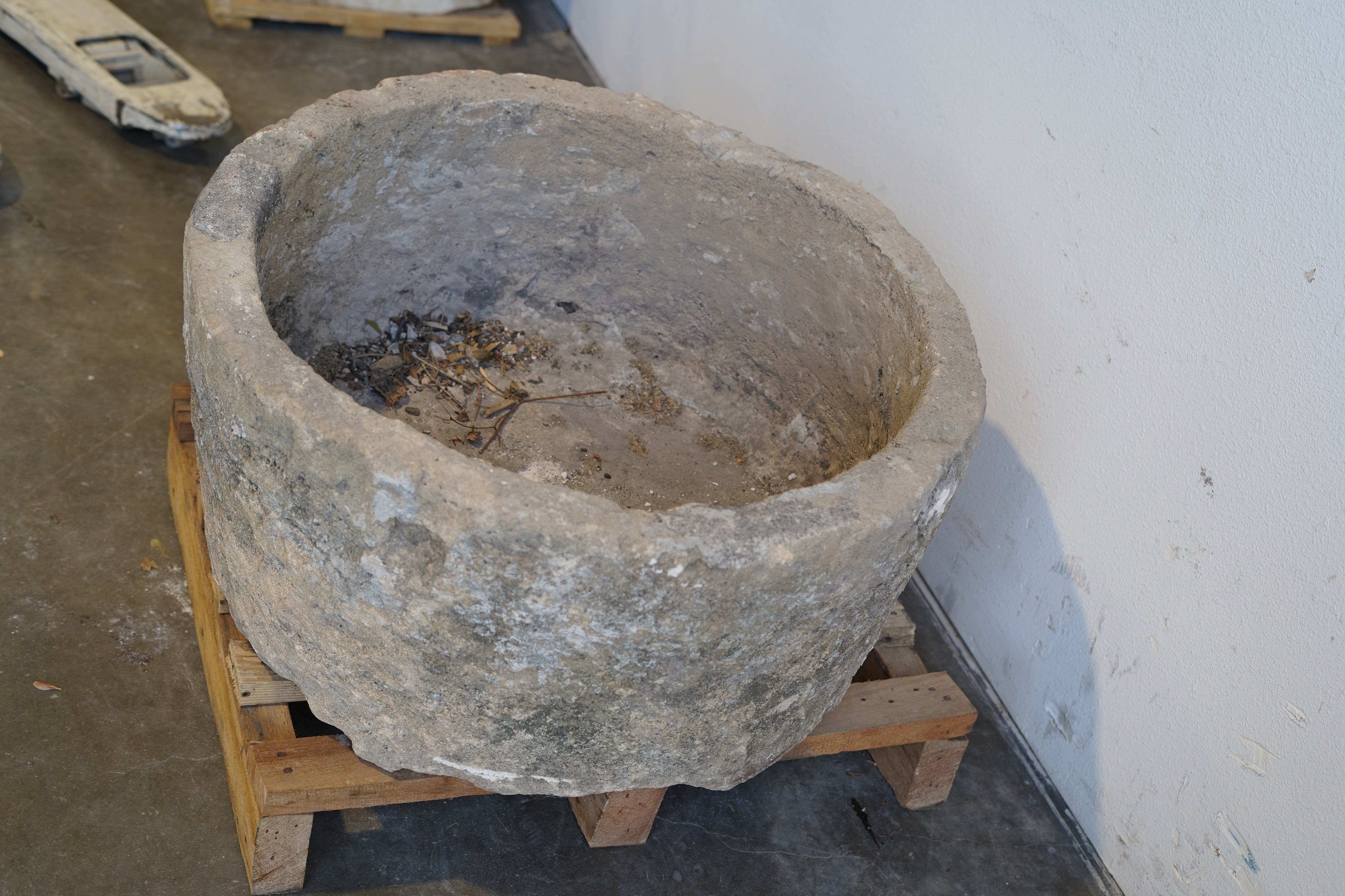Top down view of Authentic vintage limestone planter, fountain or fire pit