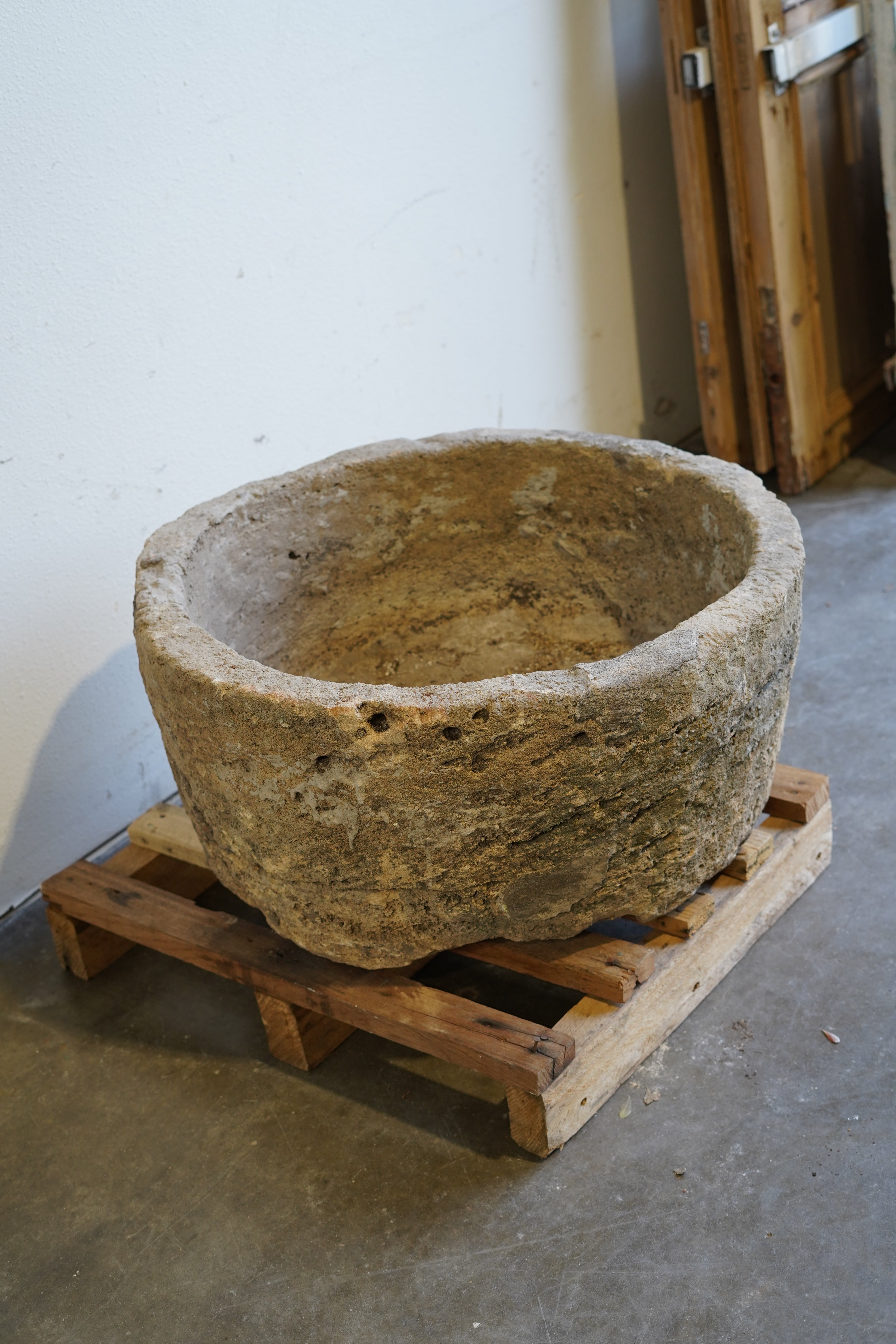 Side angle of Authentic vintage limestone planter, fountain or fire pit