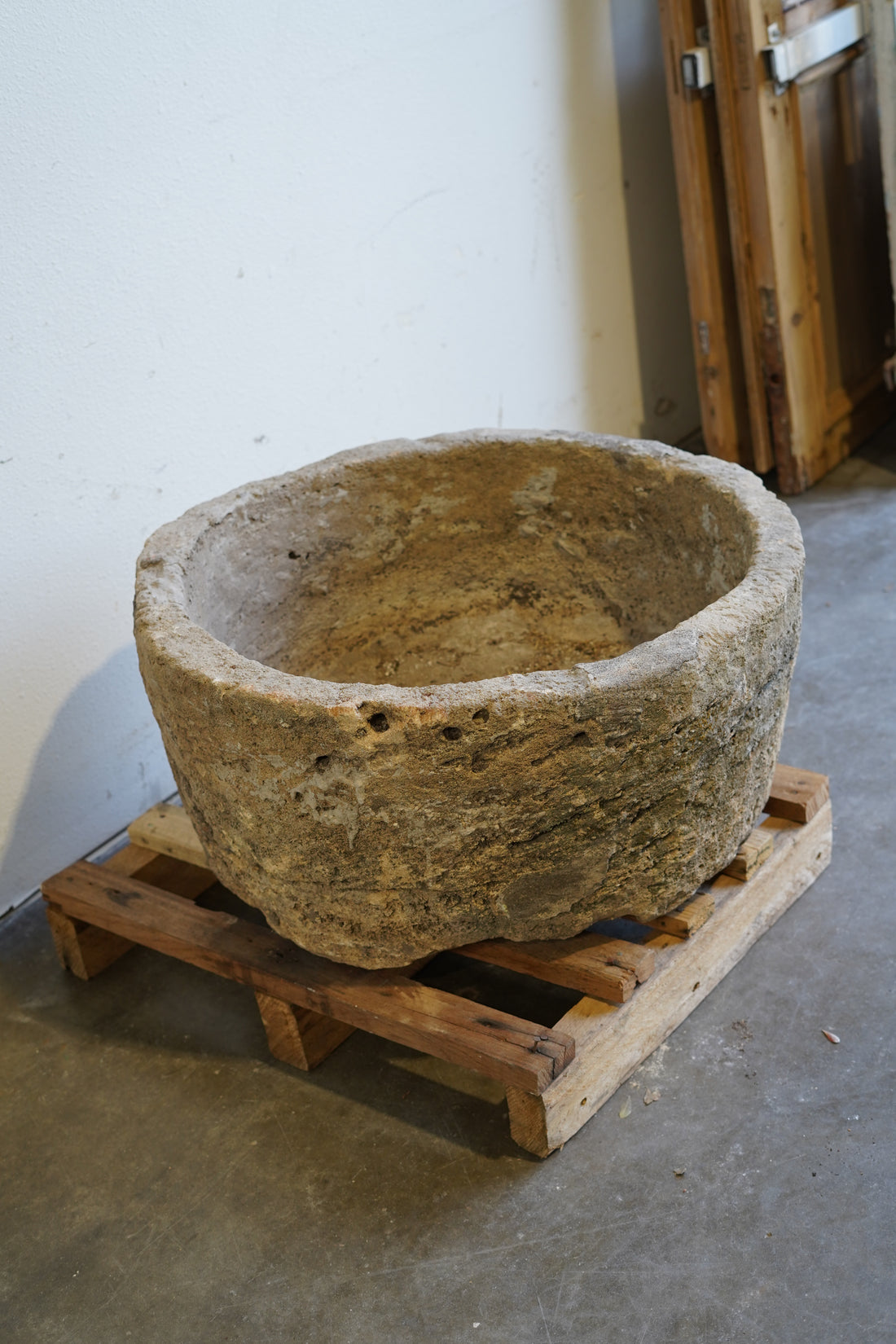 Side angle of Authentic vintage limestone planter, fountain or fire pit