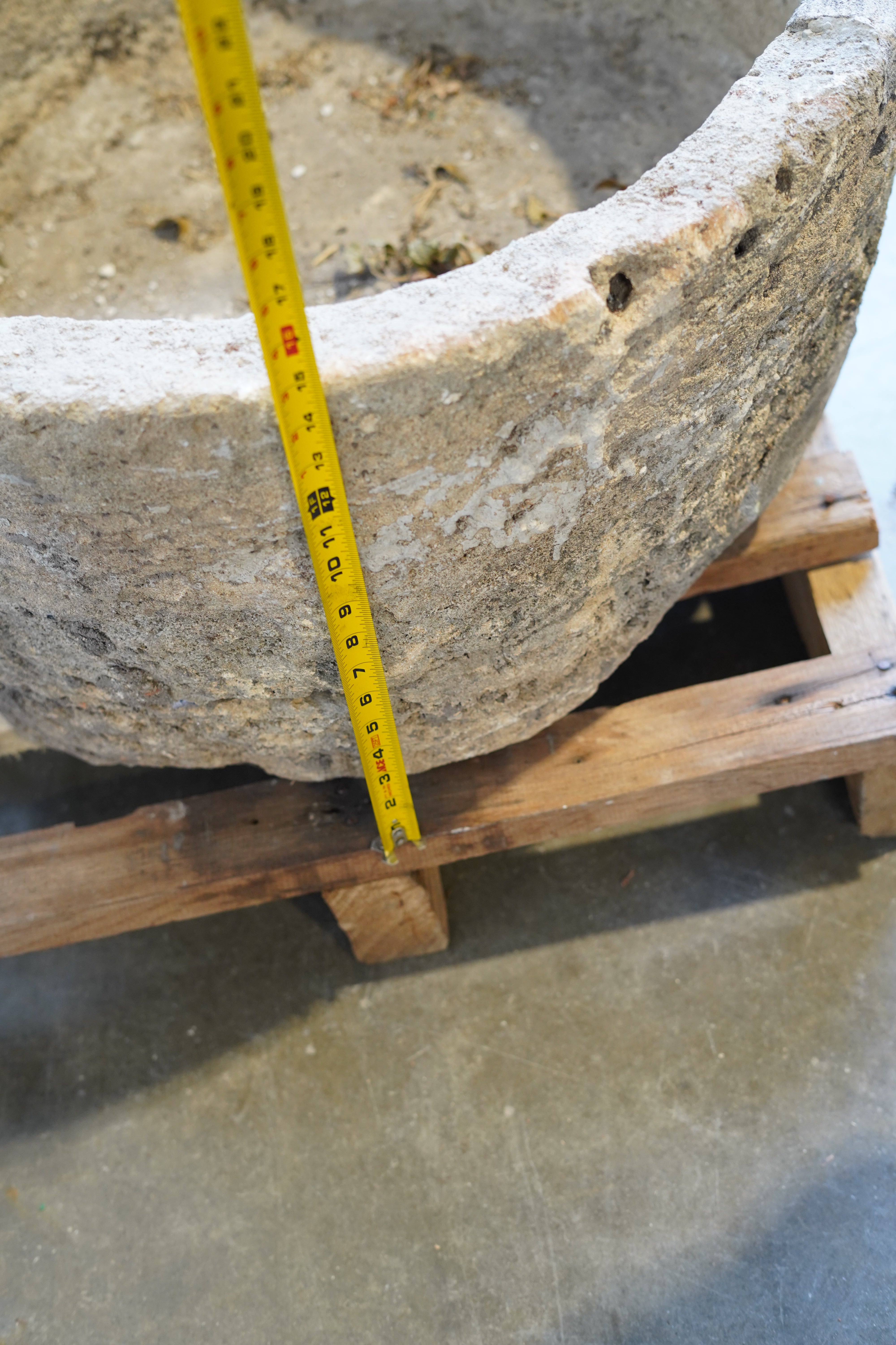 Close up of natural patina of Authentic vintage limestone planter, fountain or fire pit