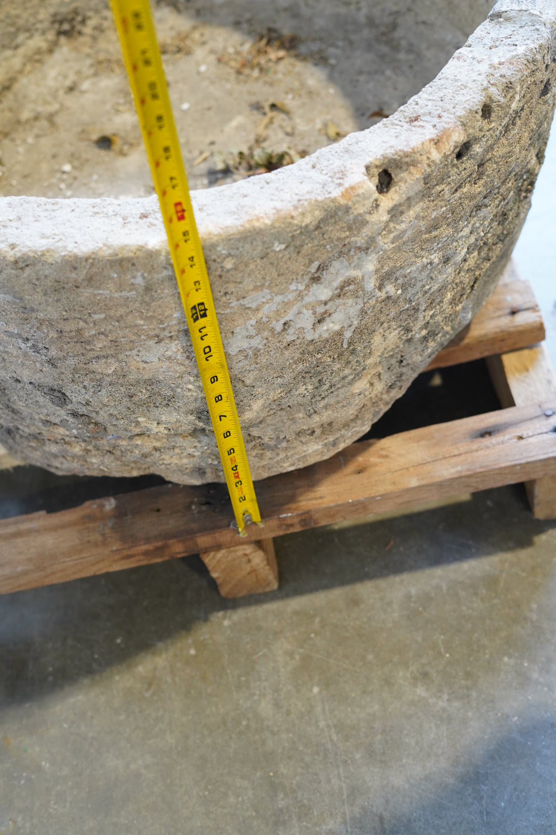 Close up of natural patina of Authentic vintage limestone planter, fountain or fire pit