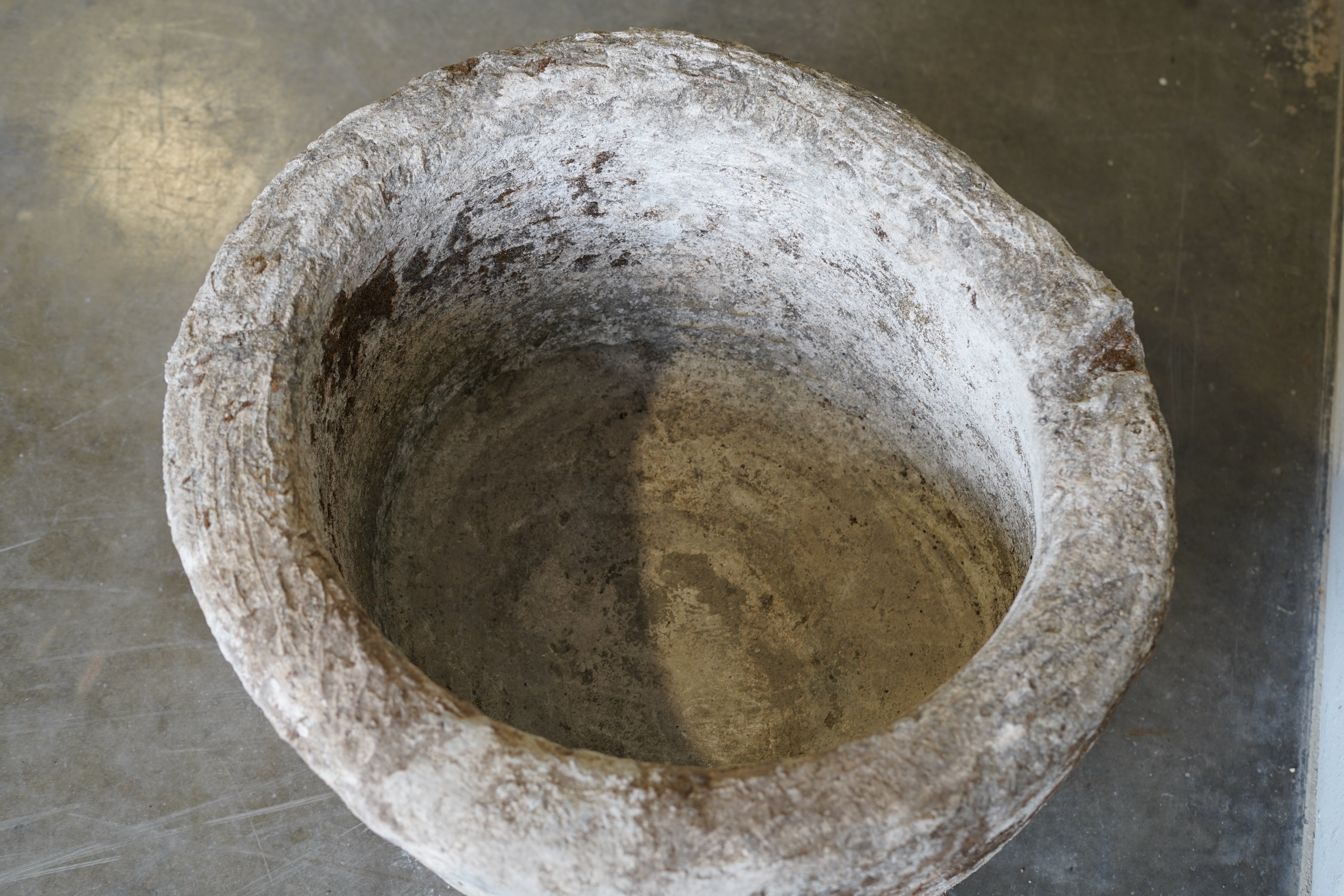 Top down view of Vintage Limestone Vessel. Hand-carved  authentic.

Dimensions: 24" W x 17" H