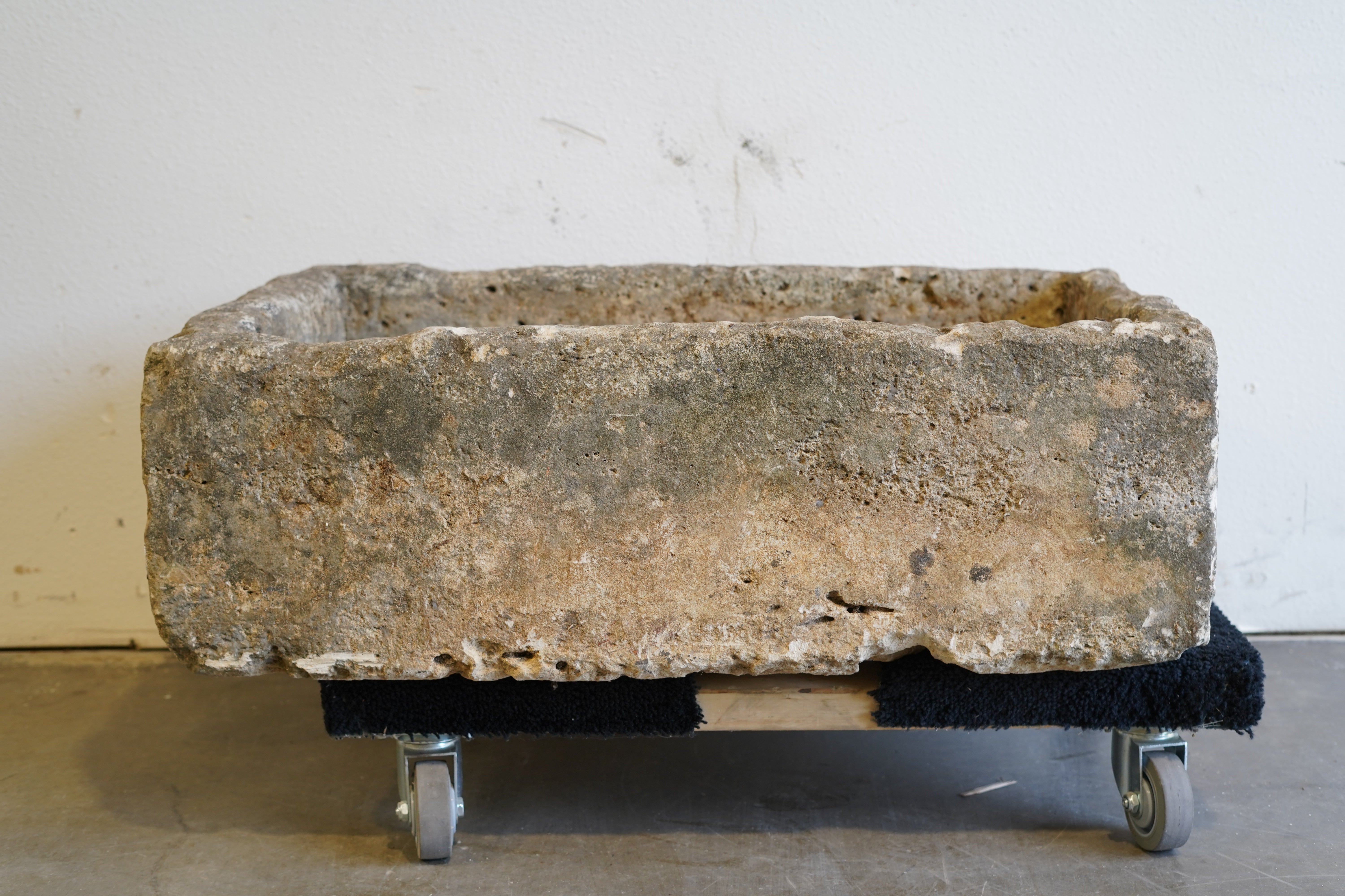 Vintage Limestone Trough

Hand-carved, authentic limestone
any limestone piece can be converted to fountain or fire pit
35" L x 23" W x 12" H