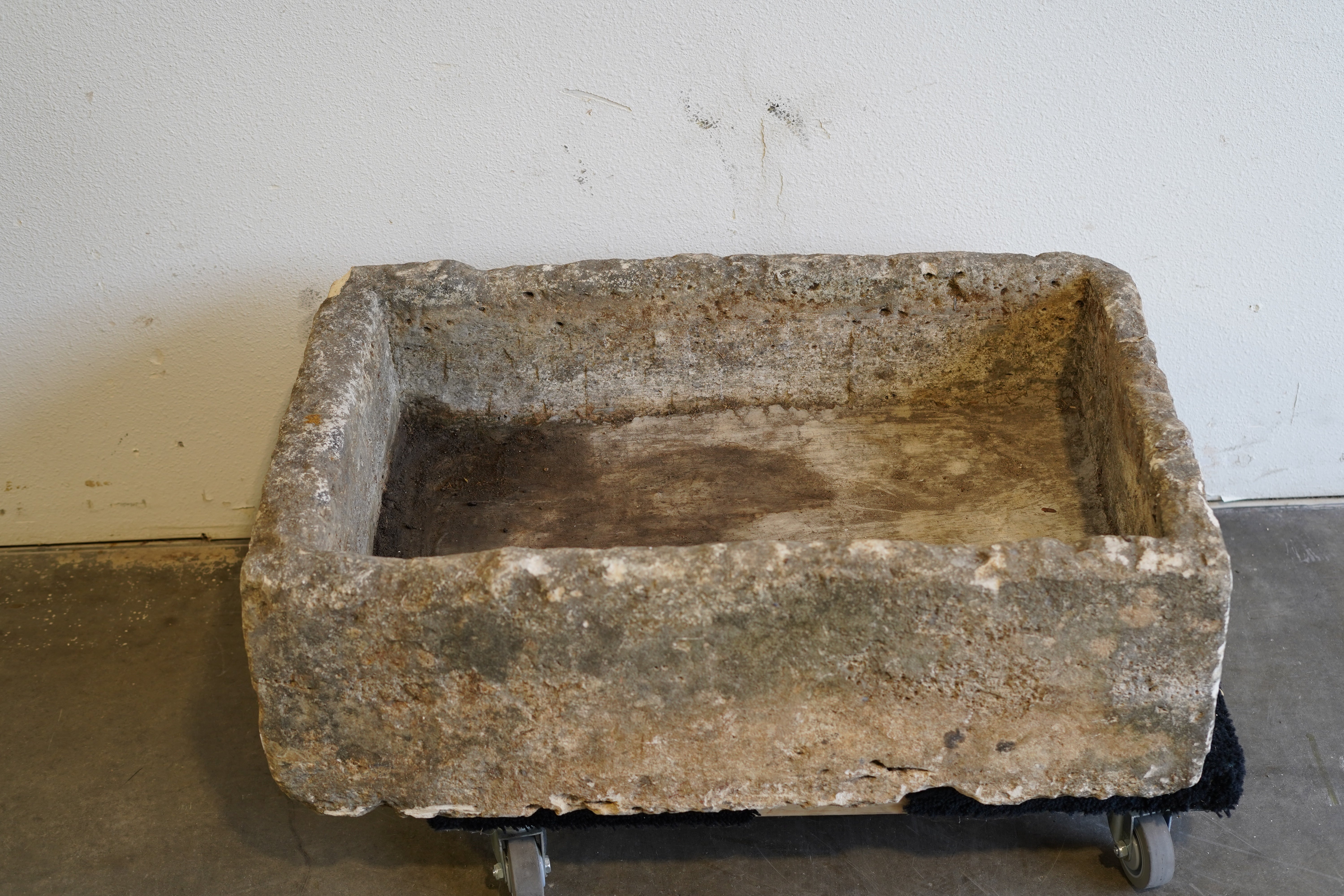 Top down view of Vintage Limestone Trough

Hand-carved, authentic limestone
any limestone piece can be converted to fountain or fire pit
35" L x 23" W x 12" H