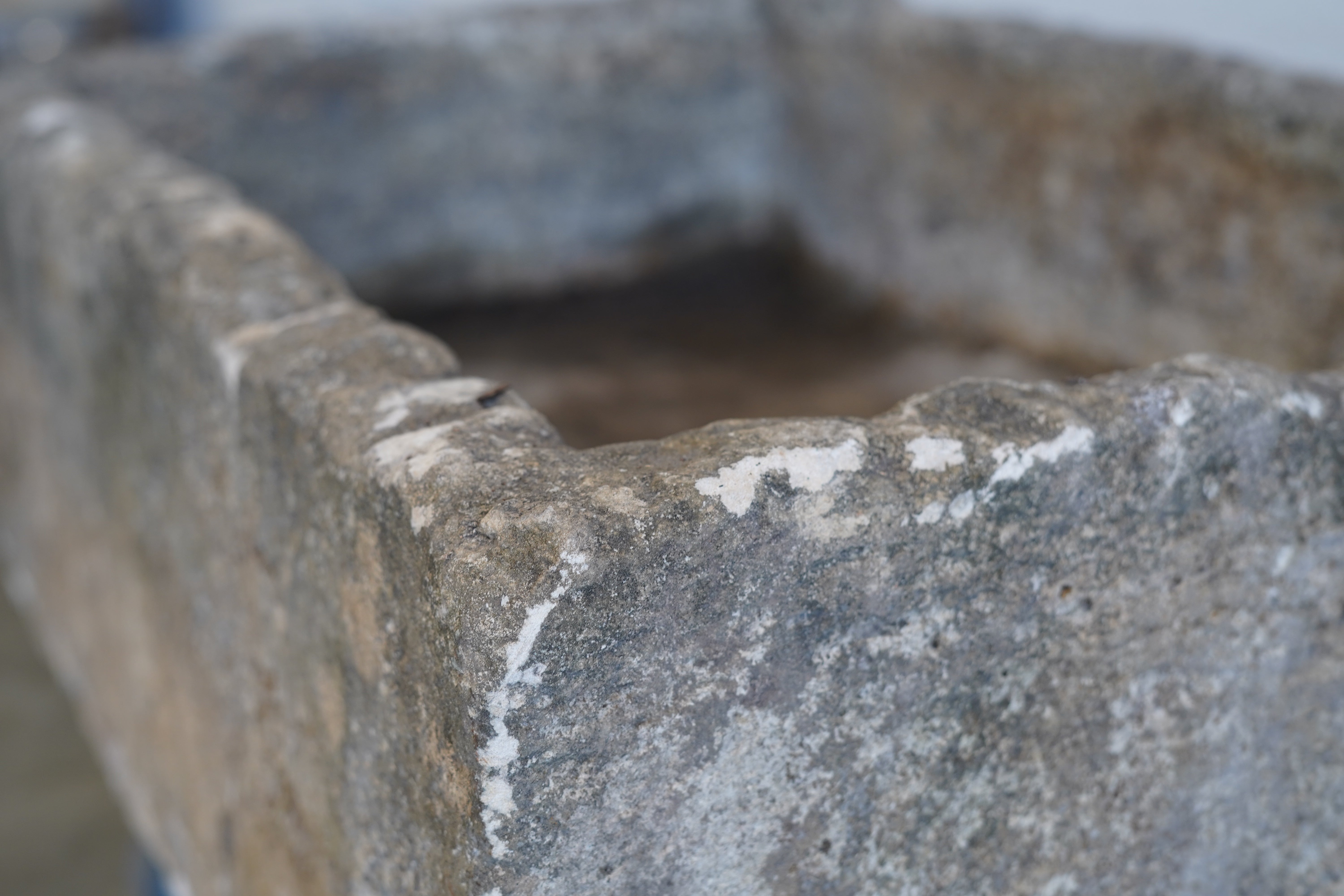 Close up of natural patina and aging on Vintage Limestone Trough

Hand-carved, authentic limestone
any limestone piece can be converted to fountain or fire pit
35" L x 23" W x 12" H