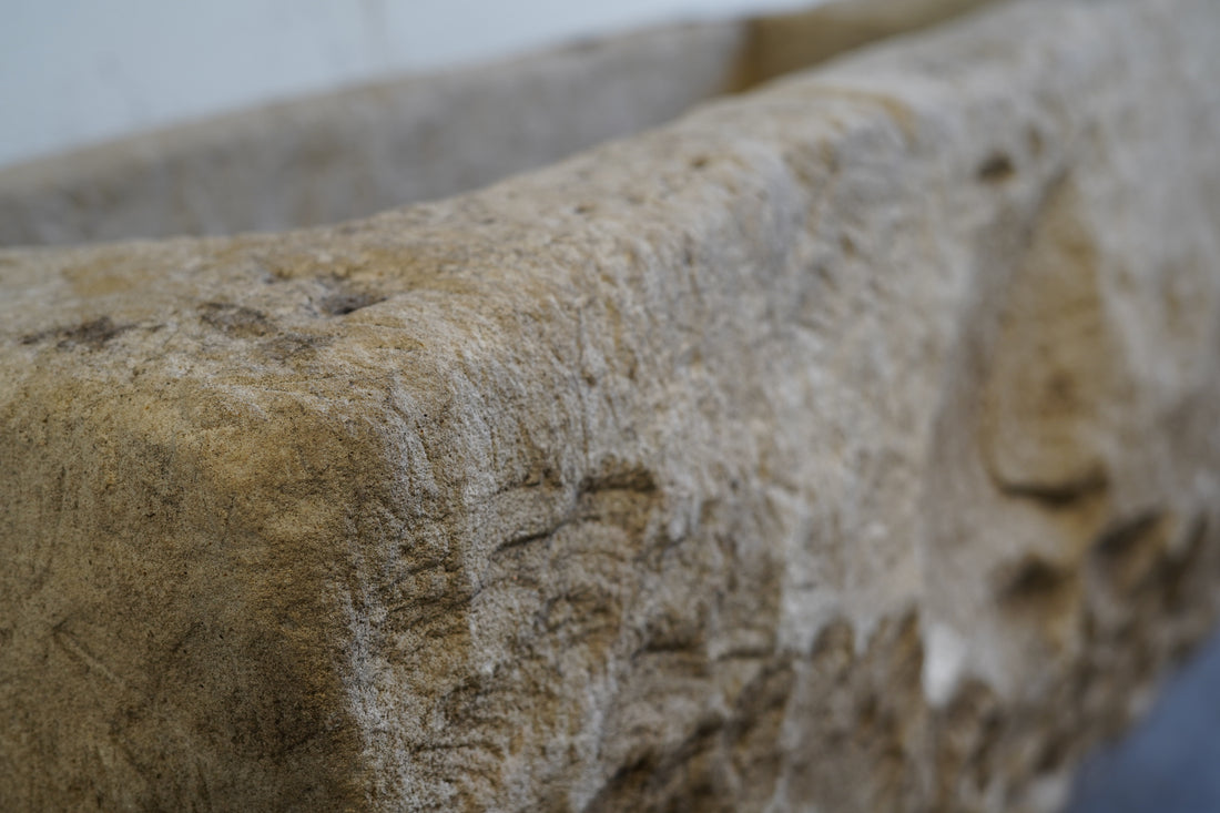 Close up of character for Vintage Limestone Trough

Beautiful character, carving
hand-carved, authentic limestone
Dimensions: 43" L x 19" W x 17" H