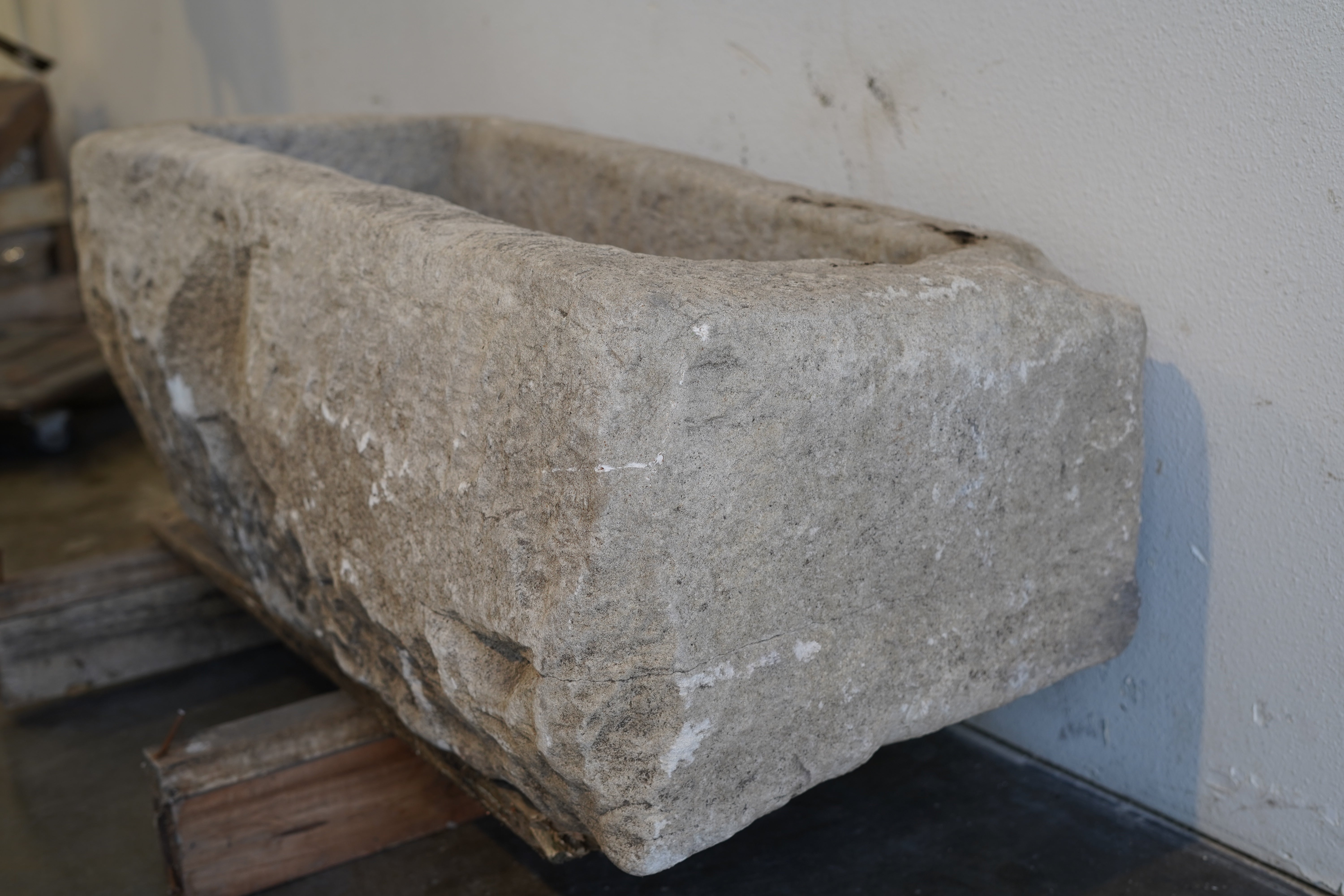 Side close up view of Vintage Limestone Trough

Beautiful character, carving
hand-carved, authentic limestone
Dimensions: 43" L x 19" W x 17" H