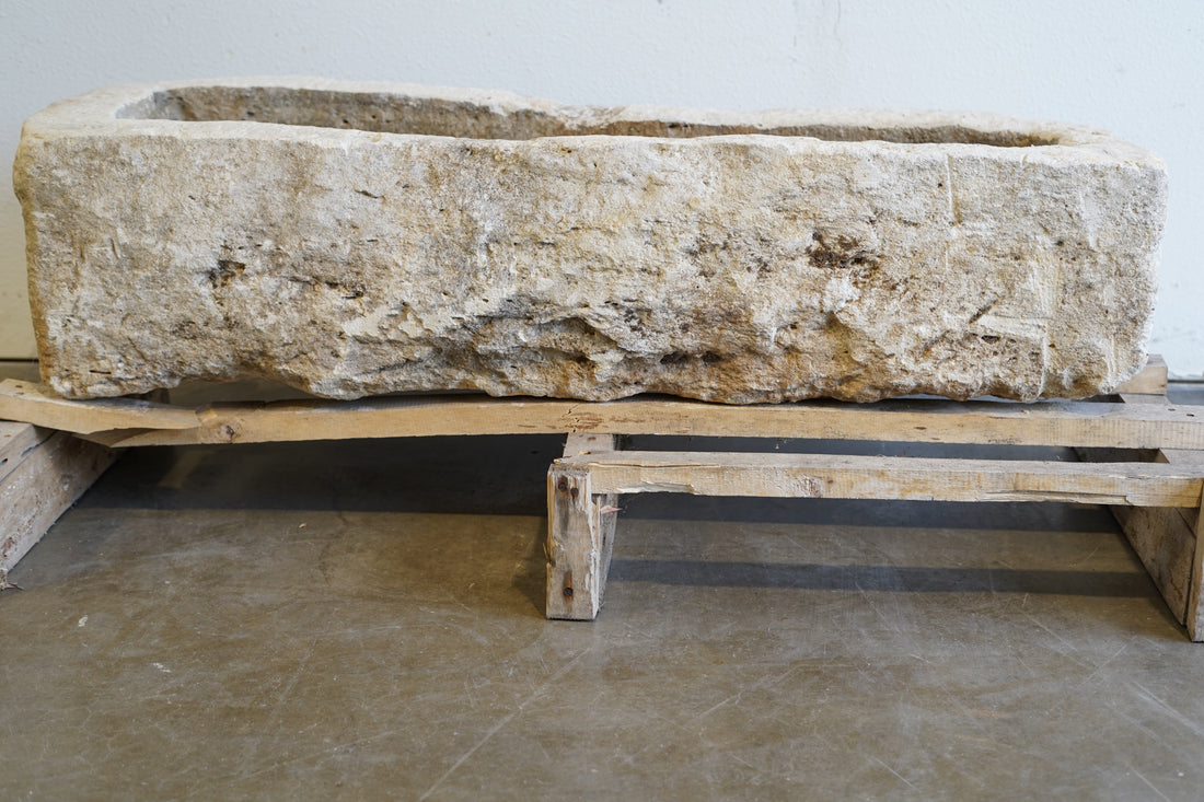 Vintage Limestone Trough

Hand-carved, authentic limestone
Beautiful exterior character, muted tones
47" L x 18" W x 12" H