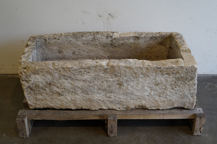 Vintage Limestone Trough

hand-carved, authentic limestone
Size: 48" L x 24" W x 16" H