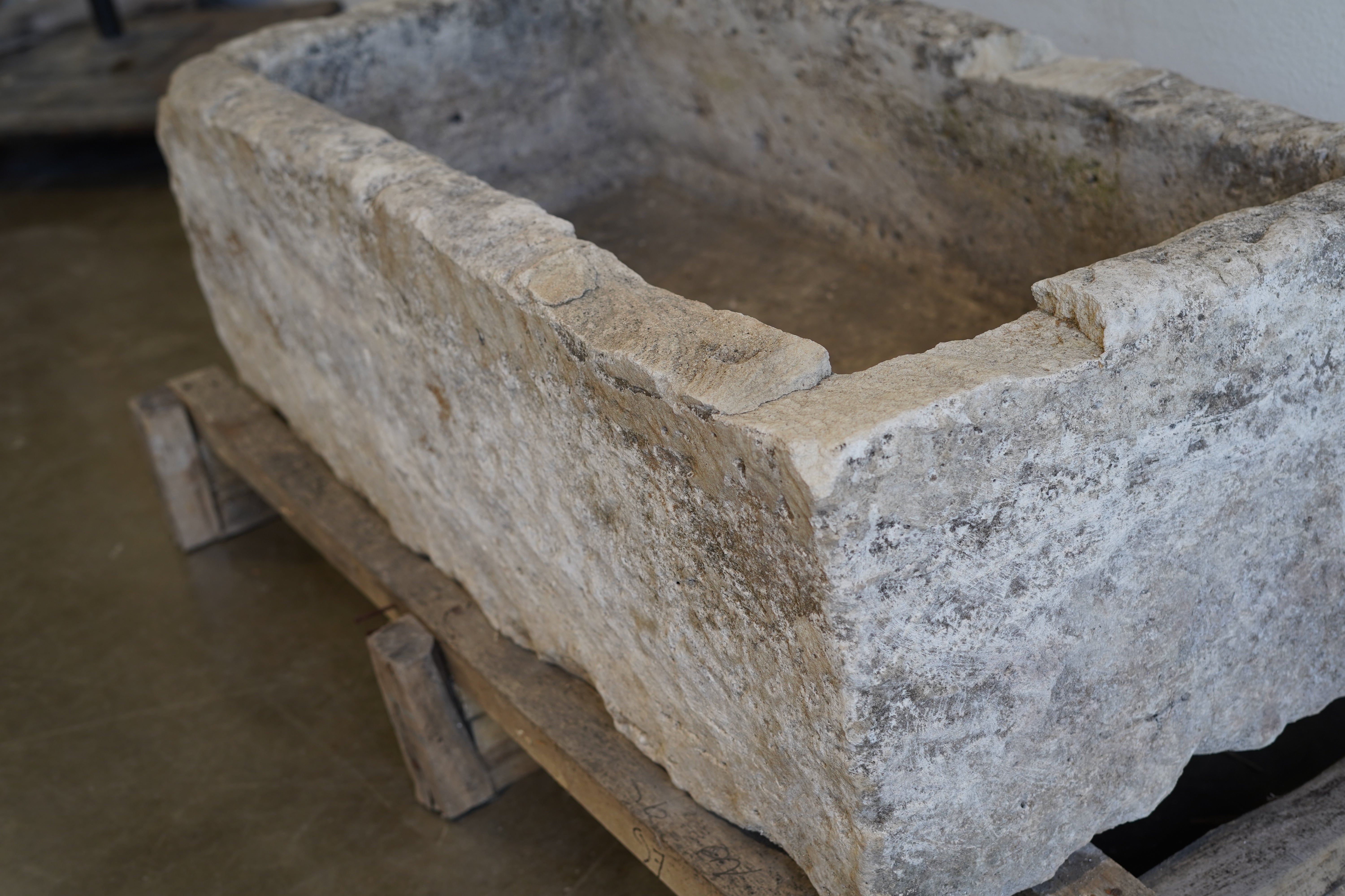 Side view of character on Vintage Limestone Trough

hand-carved, authentic limestone
Size: 48" L x 24" W x 16" H