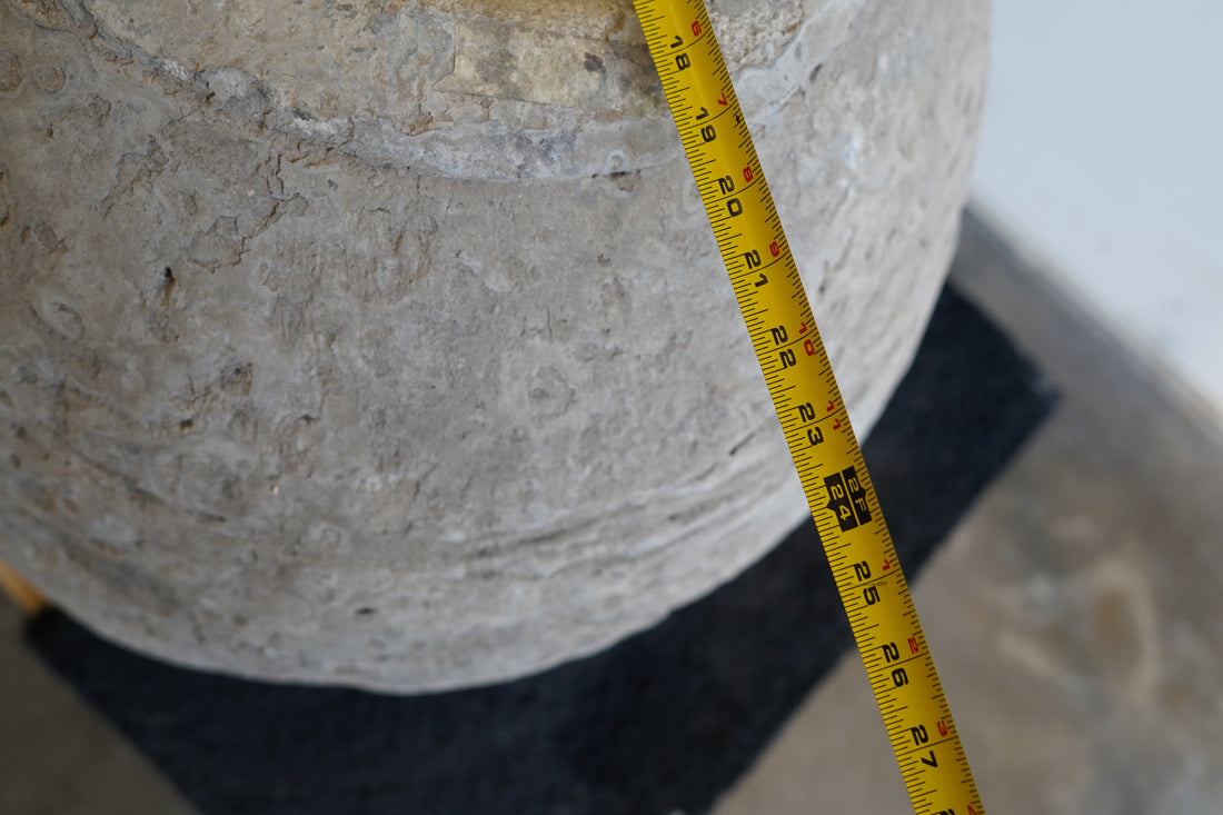 Measurement and close up of vintage limestone planter.